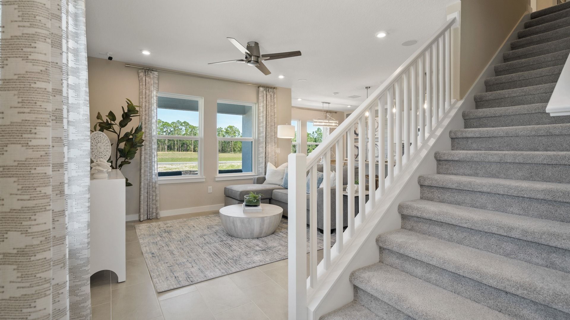 Beautiful entryway in the Coronado by DRB Homes, featuring an open staircase