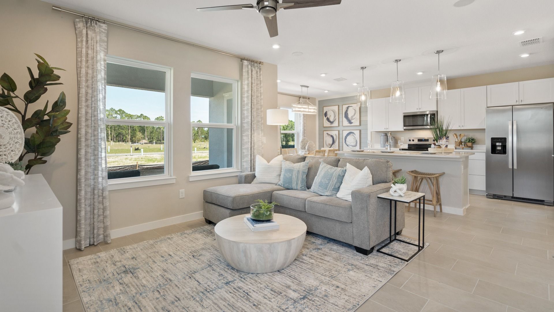 Beautiful living space by DRB Homes, featuring an open staircase and spacious layout for comfort and style