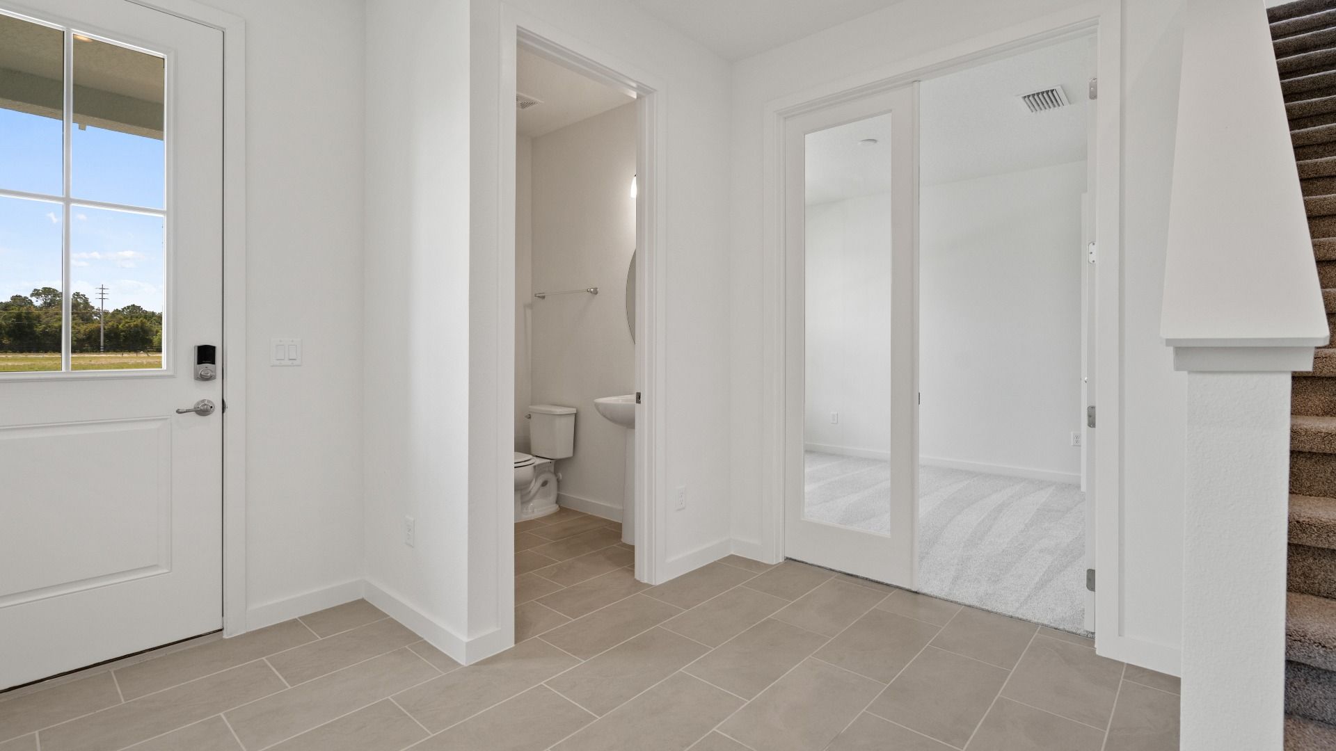Half bath and study at Trinity Place at DRB homes