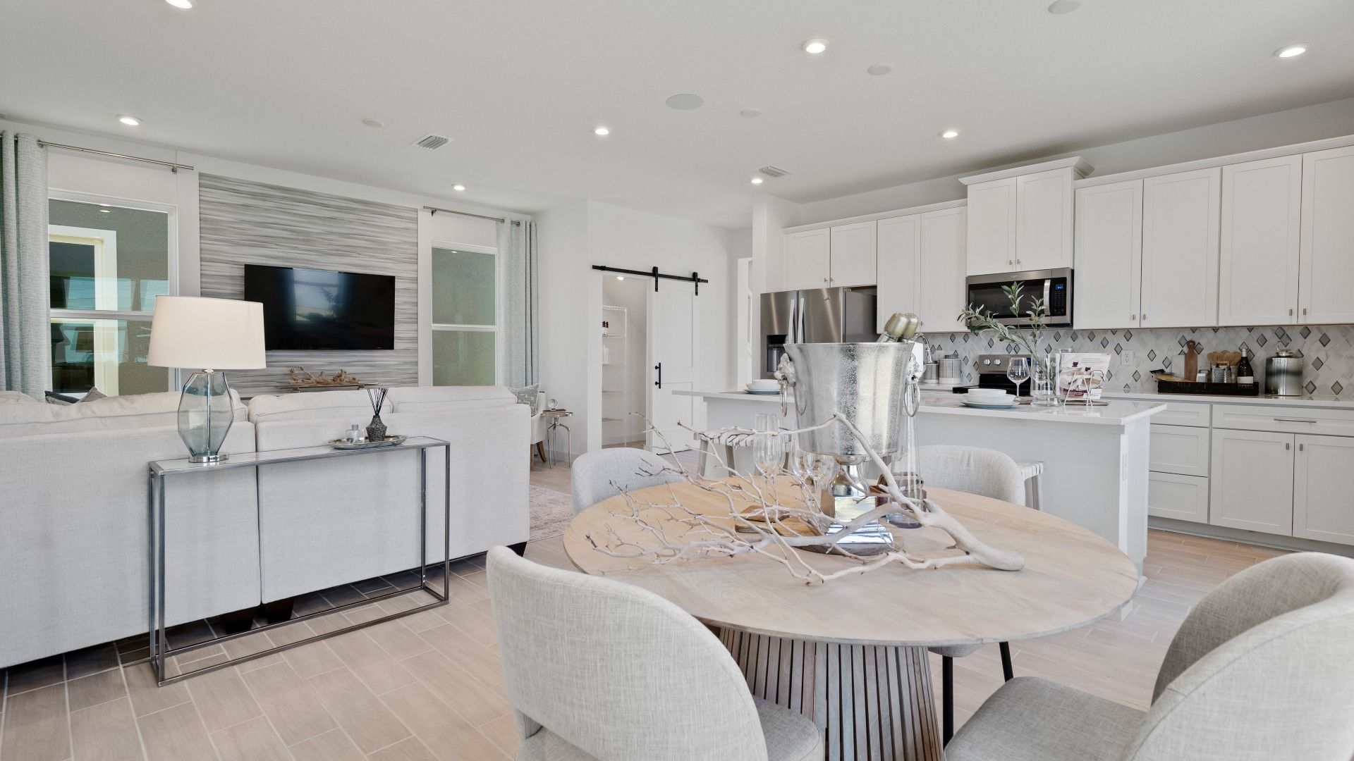 Spacious kitchen, living, and dining areas flow together seamlessly—ideal for everyday living and effortless entertaining.