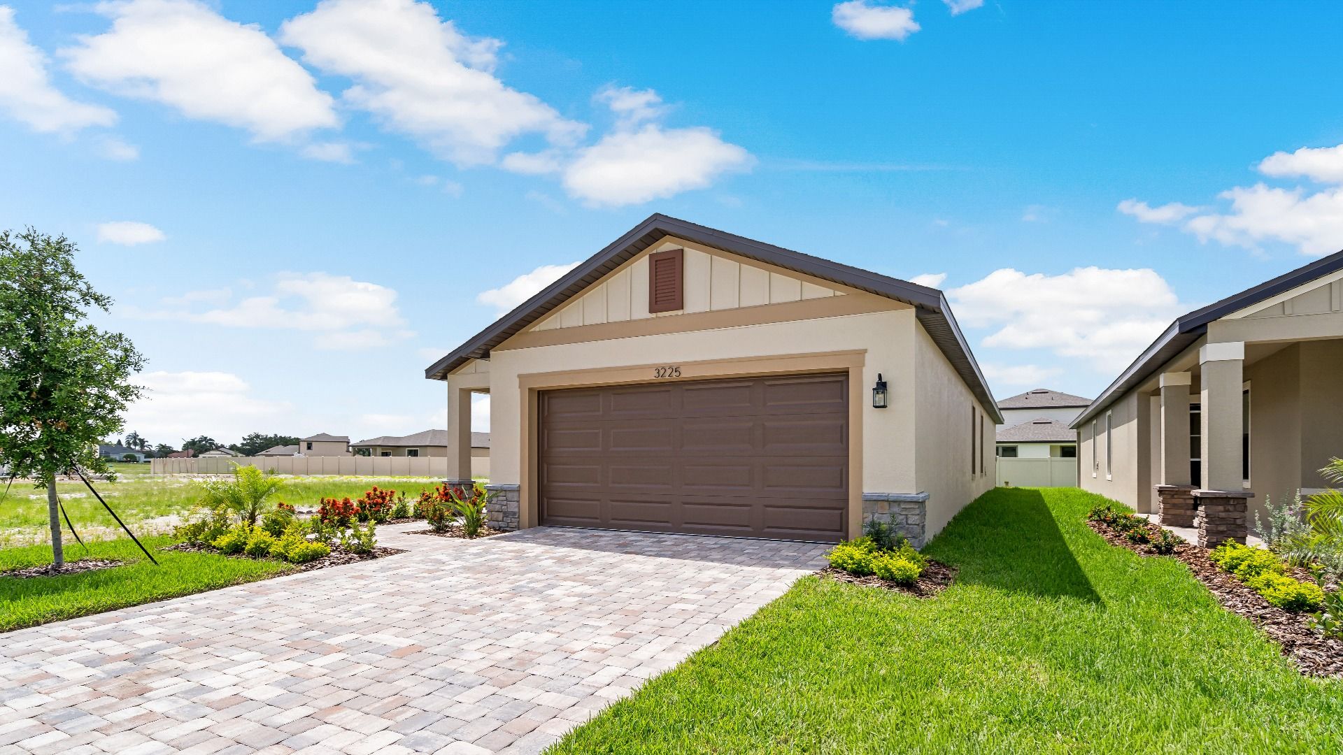 Enjoy single-level living in The Atlantic at Grasslands West—featuring a spacious layout, modern exterior, and 2-car garage.