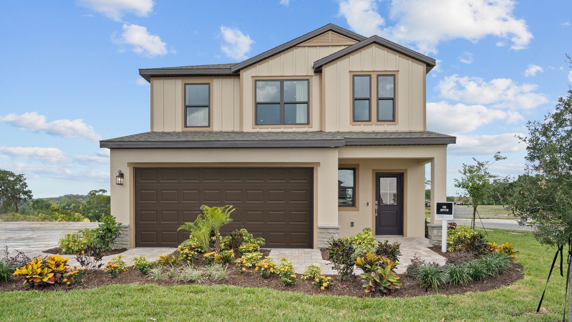 Discover The Jupiter at Grasslands West—new construction home in a gated community adjacent to Grasslands Country Club.