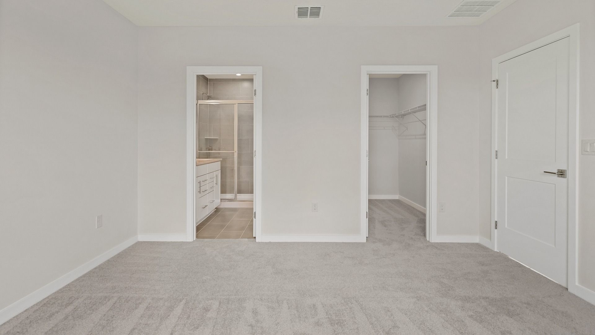 The Atlantic’s owner’s suite features plush carpet, a walk-in closet, and direct access to a spacious private bathroom.
