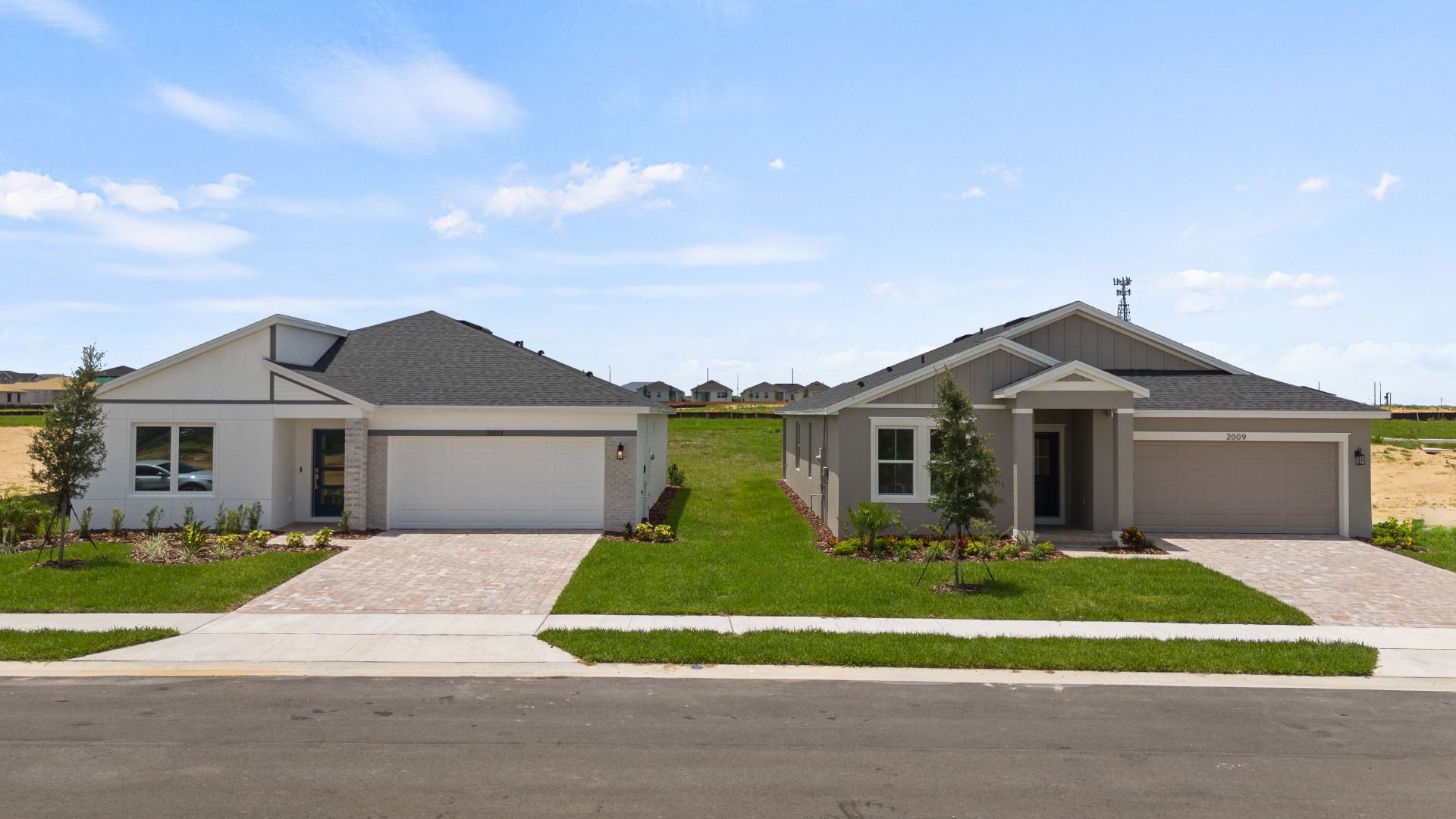 Explore the The Atwood and The Castaway at Hamilton Bluff — stylish single-family homes with modern finishes and garages