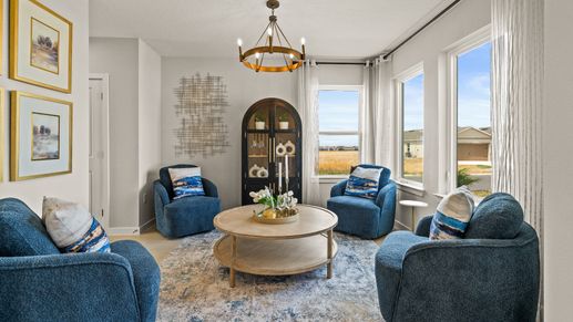 The Highbourne model at Hamilton Bluff to experience an inviting living space with elegant décor and lots of natural light.