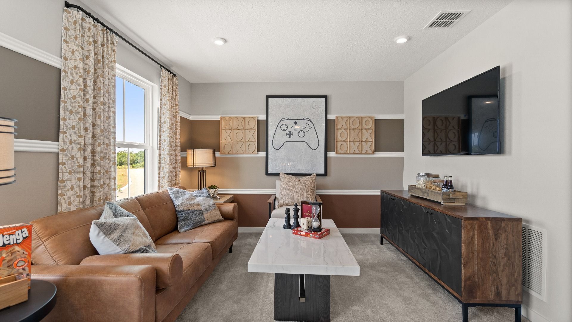 Flex Space of the Jupiter model at Grasslands West in Lakeland, FL that has been transformed into the ultimate game space.