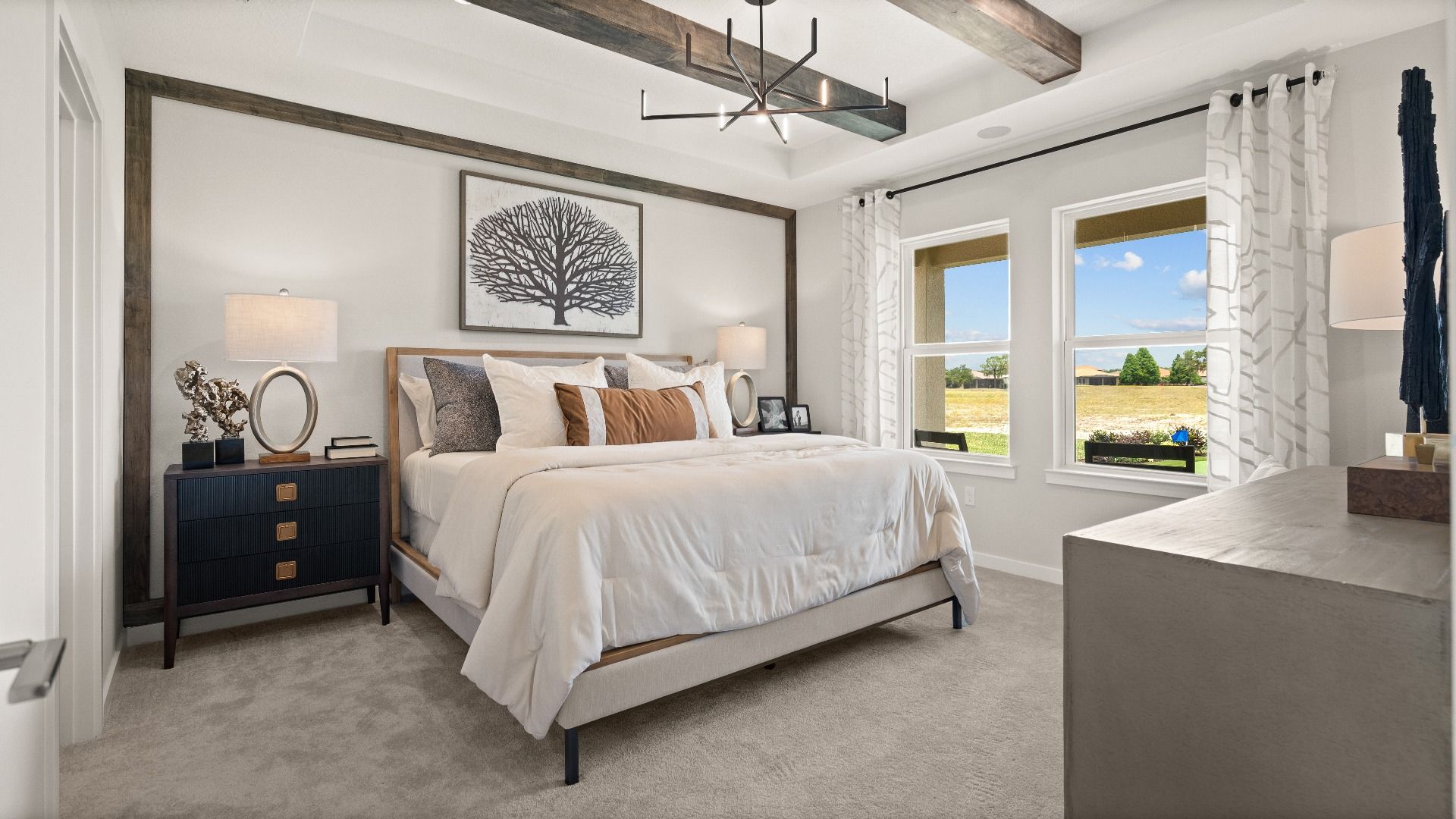 The Primary Suite at Grasslands West featuring a gorgeous view of Grasslands Golf Course at Grasslands West in Lakeland FL.