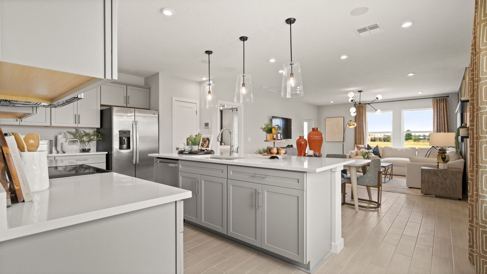 Open Concept Kitchen with spacious island at the Jupiter Model at Grasslands West in Lakeland, FL