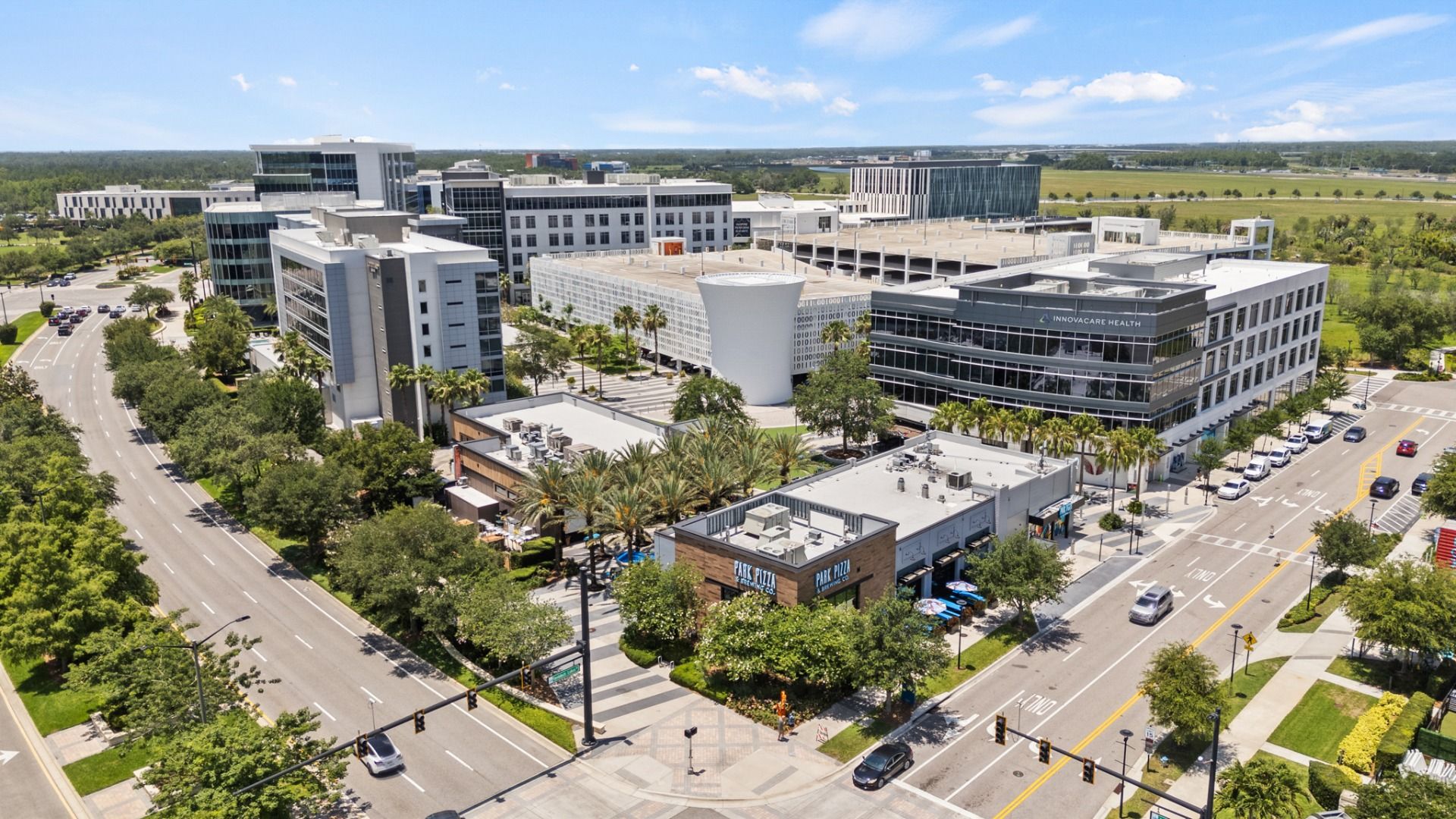 Aerial view of Lake Nona Town Center in Orlando, FL a hub for shopping, dining, and business near DRB Homes Cyrene at Harmony