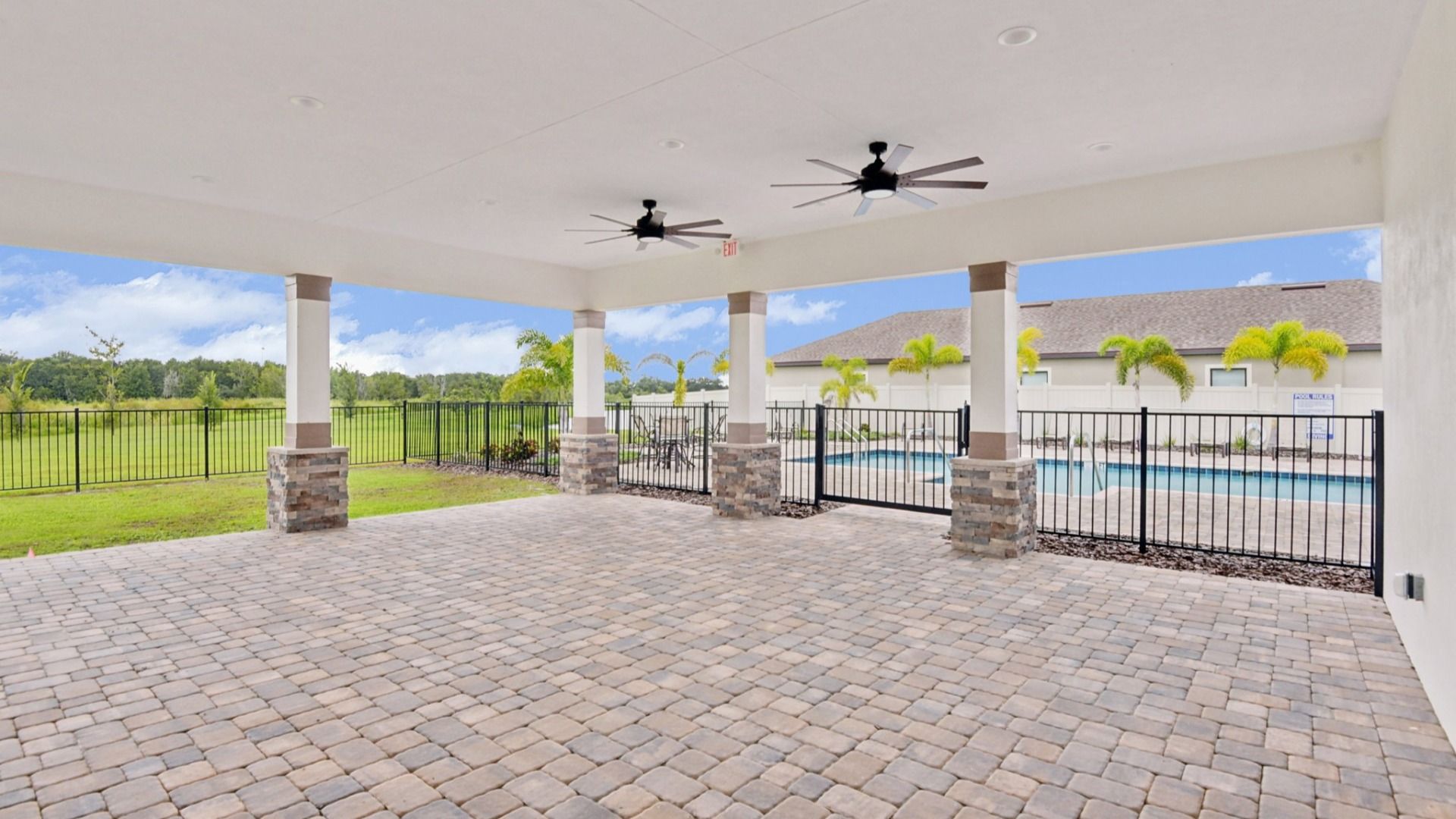 Enjoy the spacious covered pavilion at Grasslands West in Lakeland FL—perfect for relaxing or gathering with neighbors.