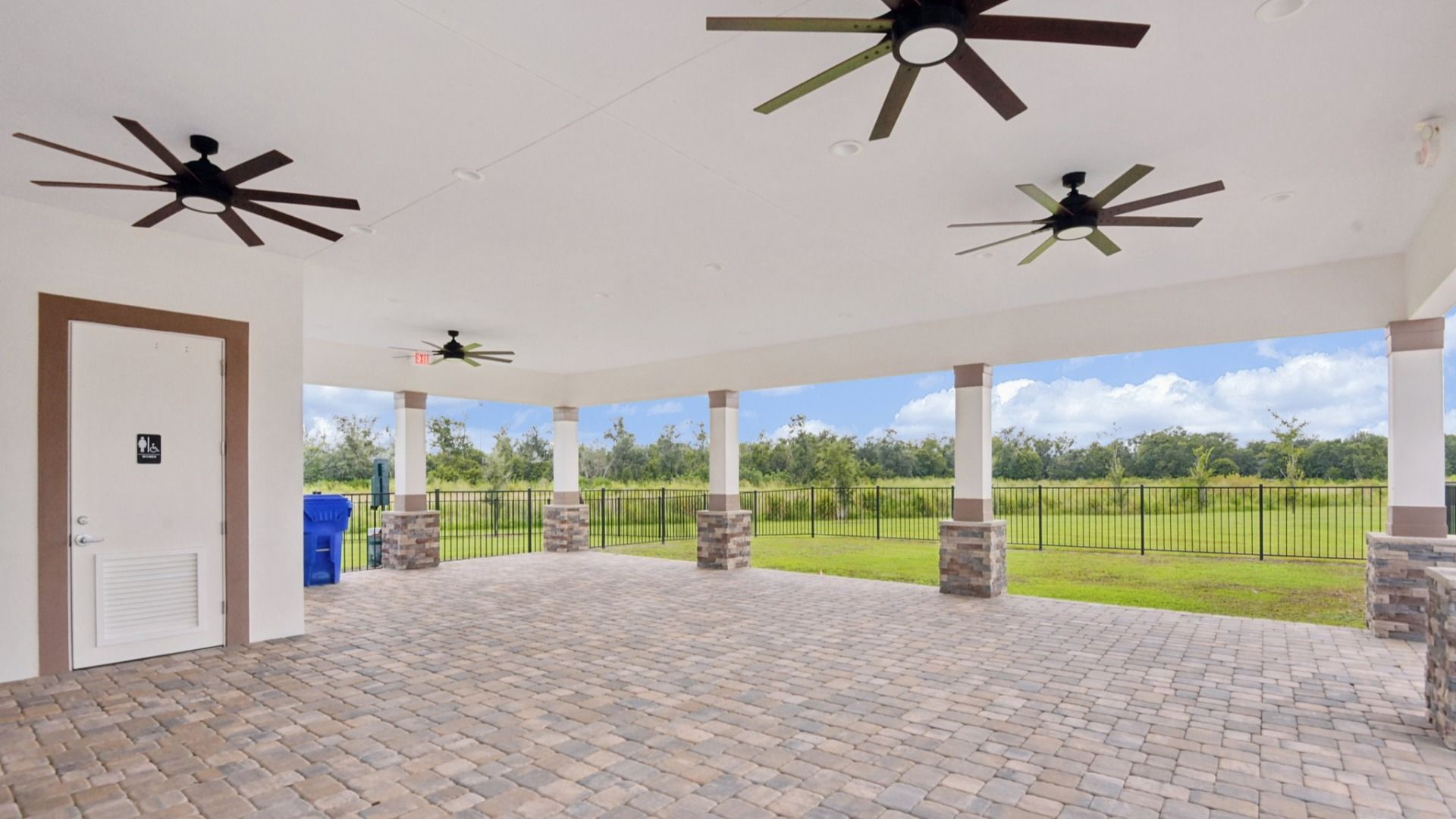 Enjoy the spacious covered pavilion at Grasslands West in Lakeland FL—perfect for relaxing or gathering with neighbors.