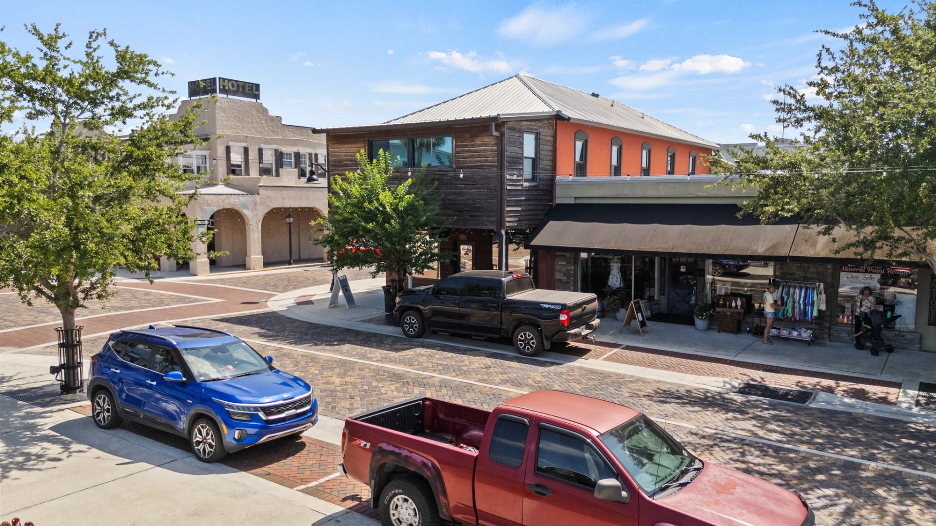 Charming shops and historic buildings along the brick-paved streets of downtown St. Cloud, FL near Cyrene at Harmony.