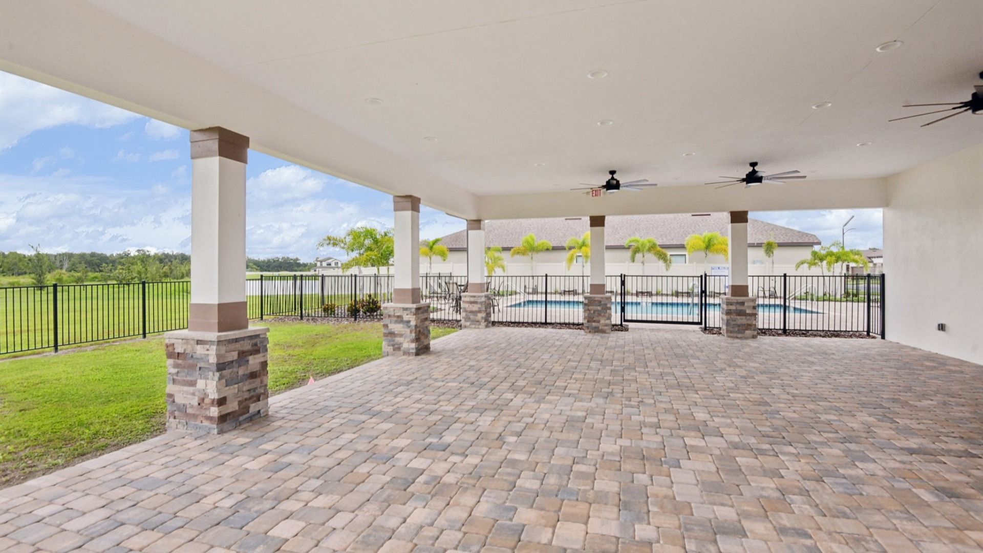Enjoy the spacious covered pavilion at Grasslands West in Lakeland FL—perfect for relaxing or gathering with neighbors.