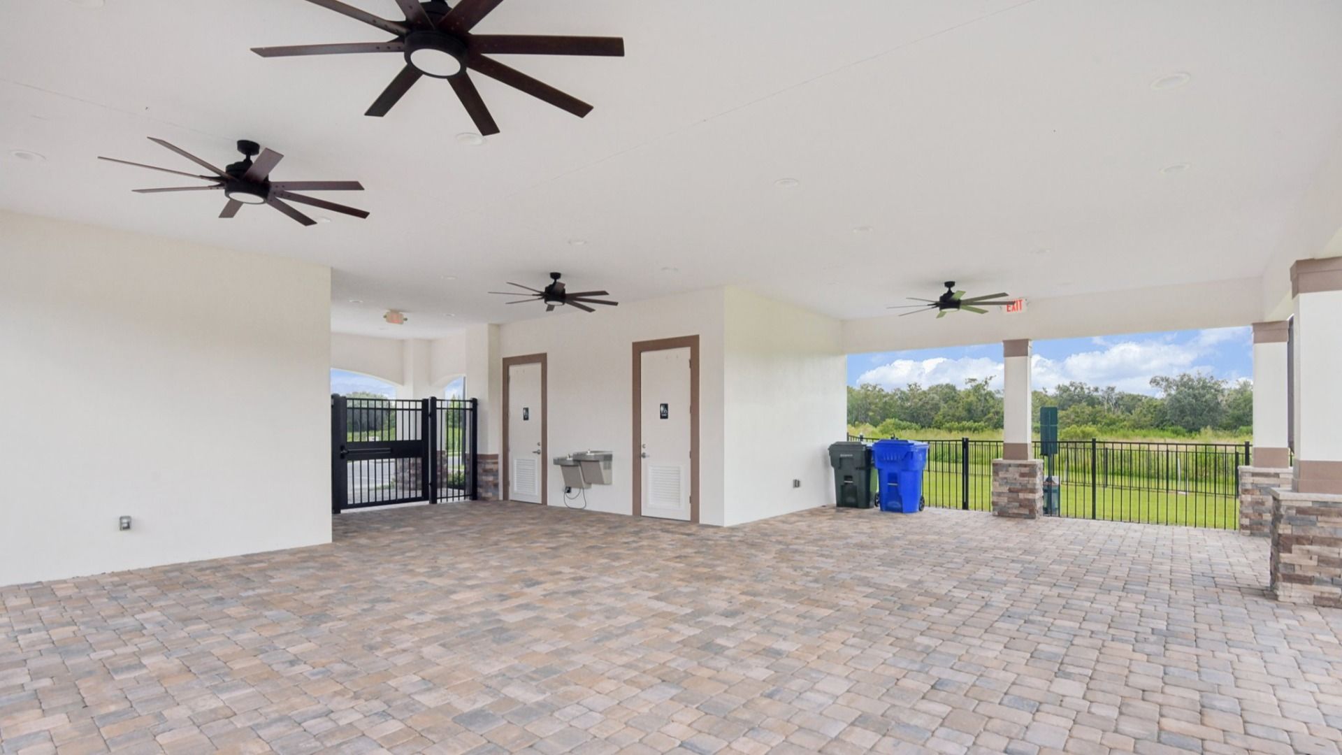 Enjoy the spacious covered pavilion at Grasslands West in Lakeland FL—perfect for relaxing or gathering with neighbors.