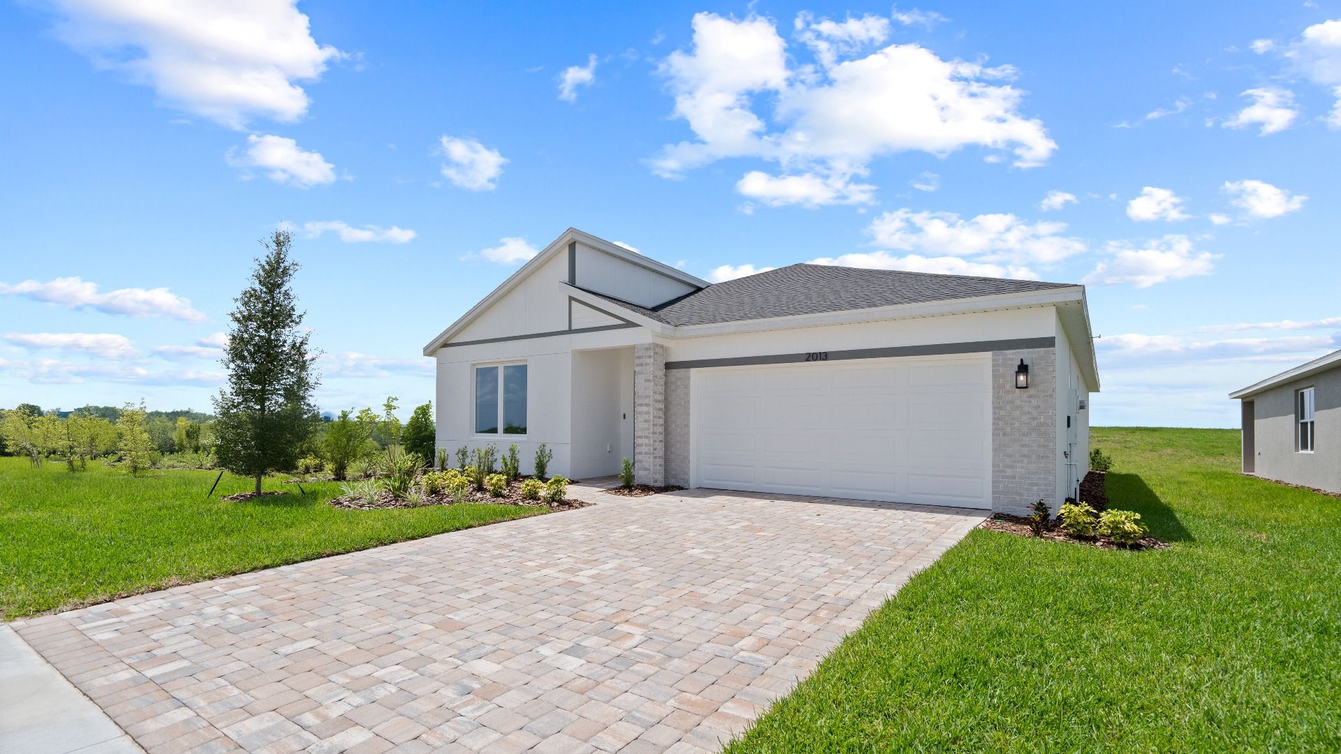The Atwood Exterior by DRB Homes in Hamilton Bluff, Haines City, FL