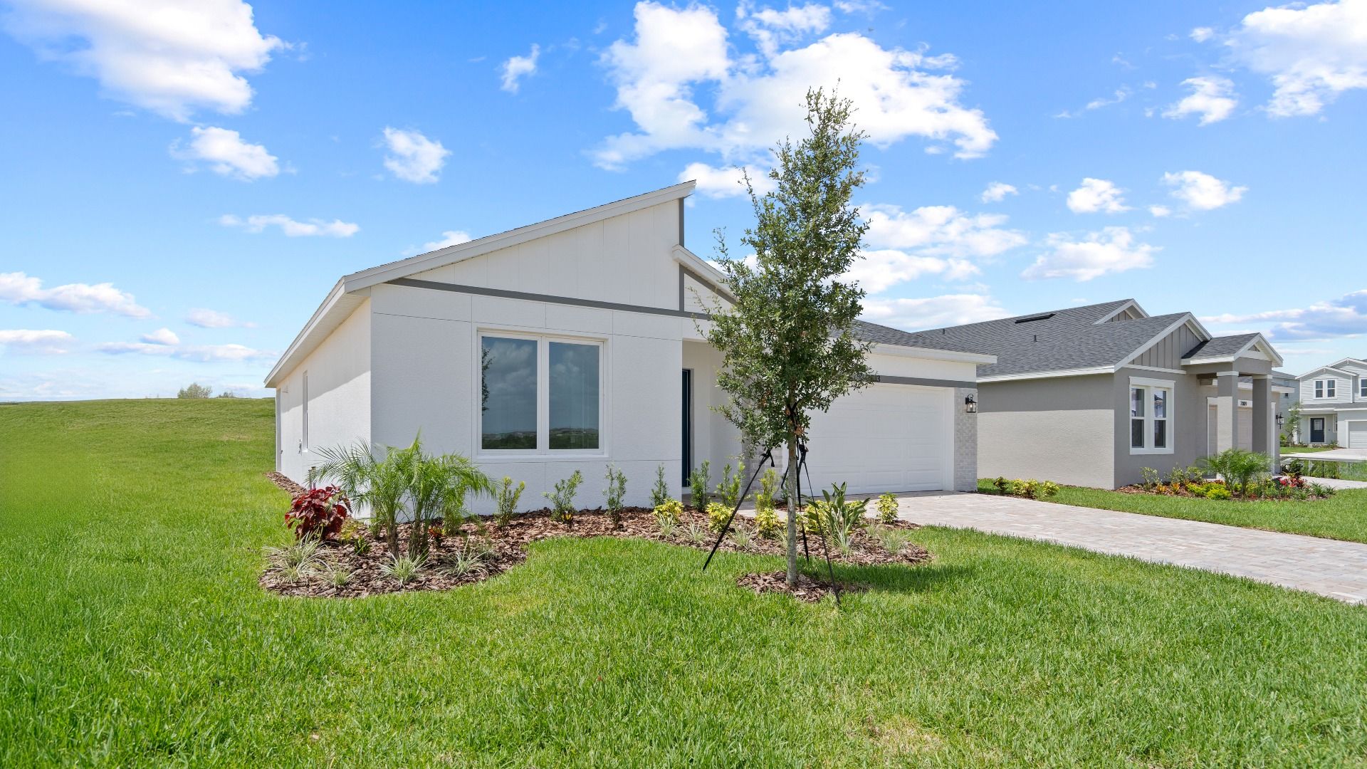 The Atwood Exterior by DRB Homes in Hamilton Bluff, Haines City, FL