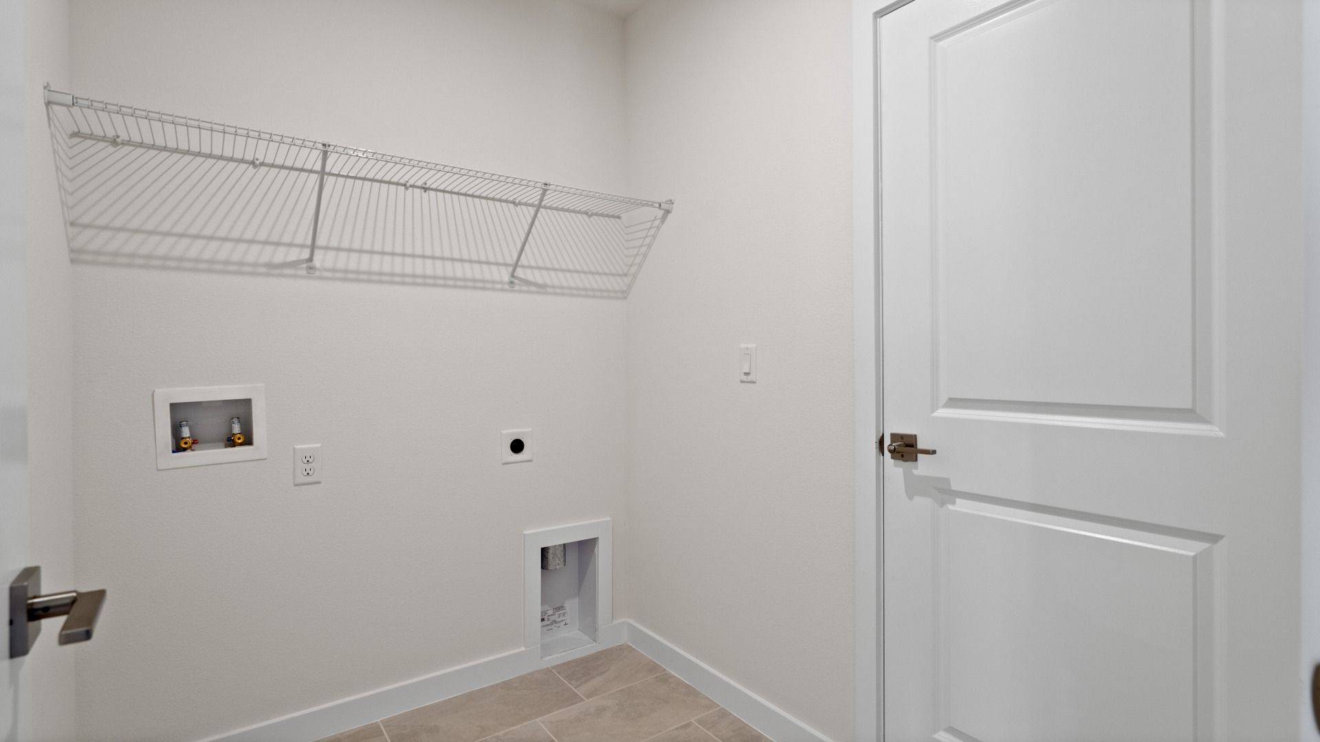 The Atwood Laundry Room by DRB Homes in Hamilton Bluff, Haines City, FL