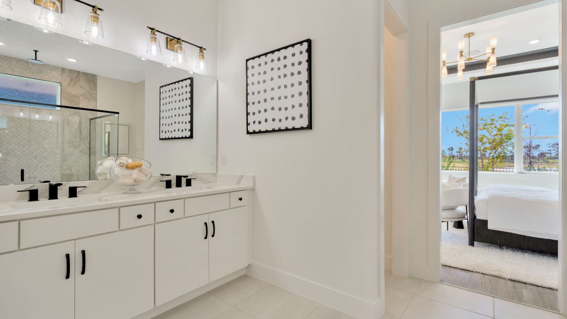 The Primary Bathroom of a DRB Homes Grand Eider model, which is a home plan offered at Serengeti in Spring Hill, FL.