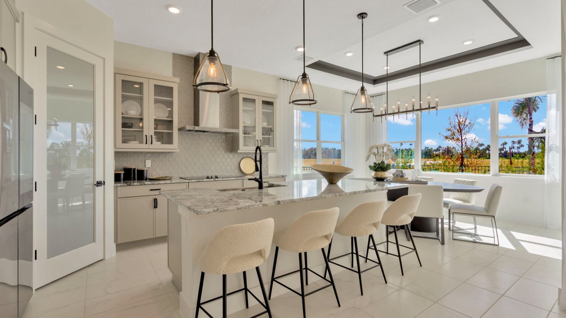 The Kitchen of a DRB Homes Grand Eider model, which is a home plan offered at Serengeti in Spring Hill, FL.