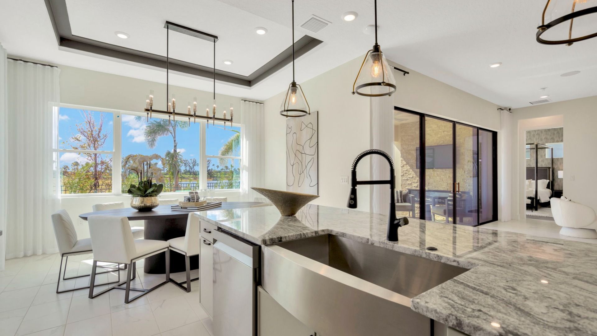 The Kitchen of a DRB Homes Grand Eider model, which is a home plan offered at Serengeti in Spring Hill, FL.