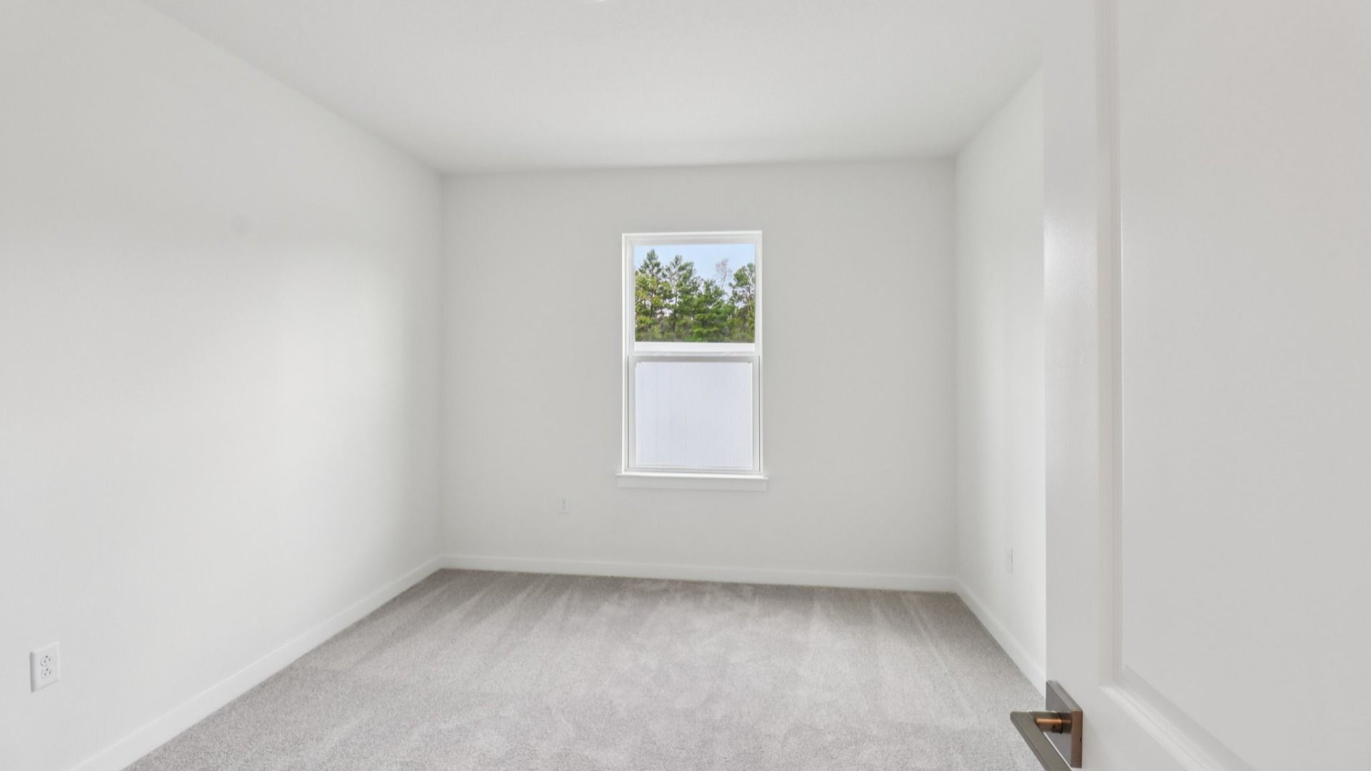 Guest Bed in the Monterey End Townhome by DRB Homes - Cyrene at Harmony in St Cloud FL