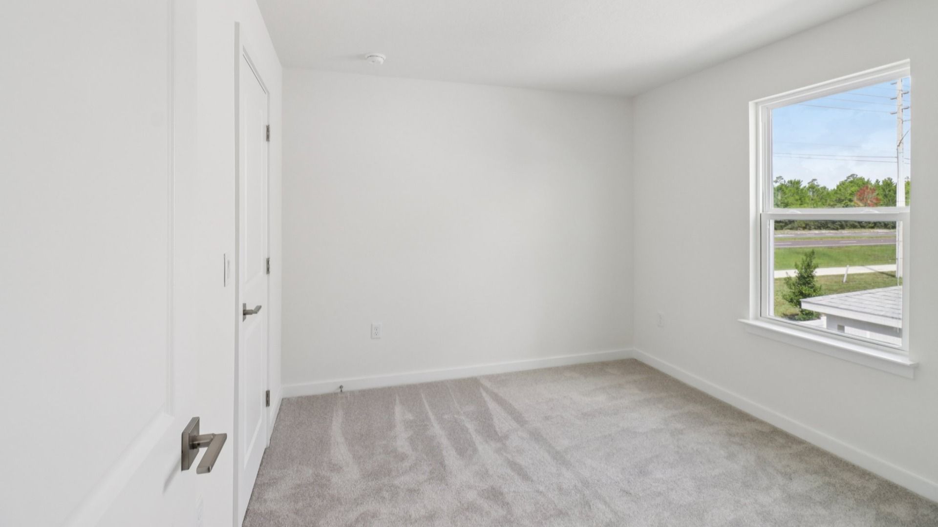 Guest Bed in the Monterey End Townhome by DRB Homes - Cyrene at Harmony in St Cloud FL