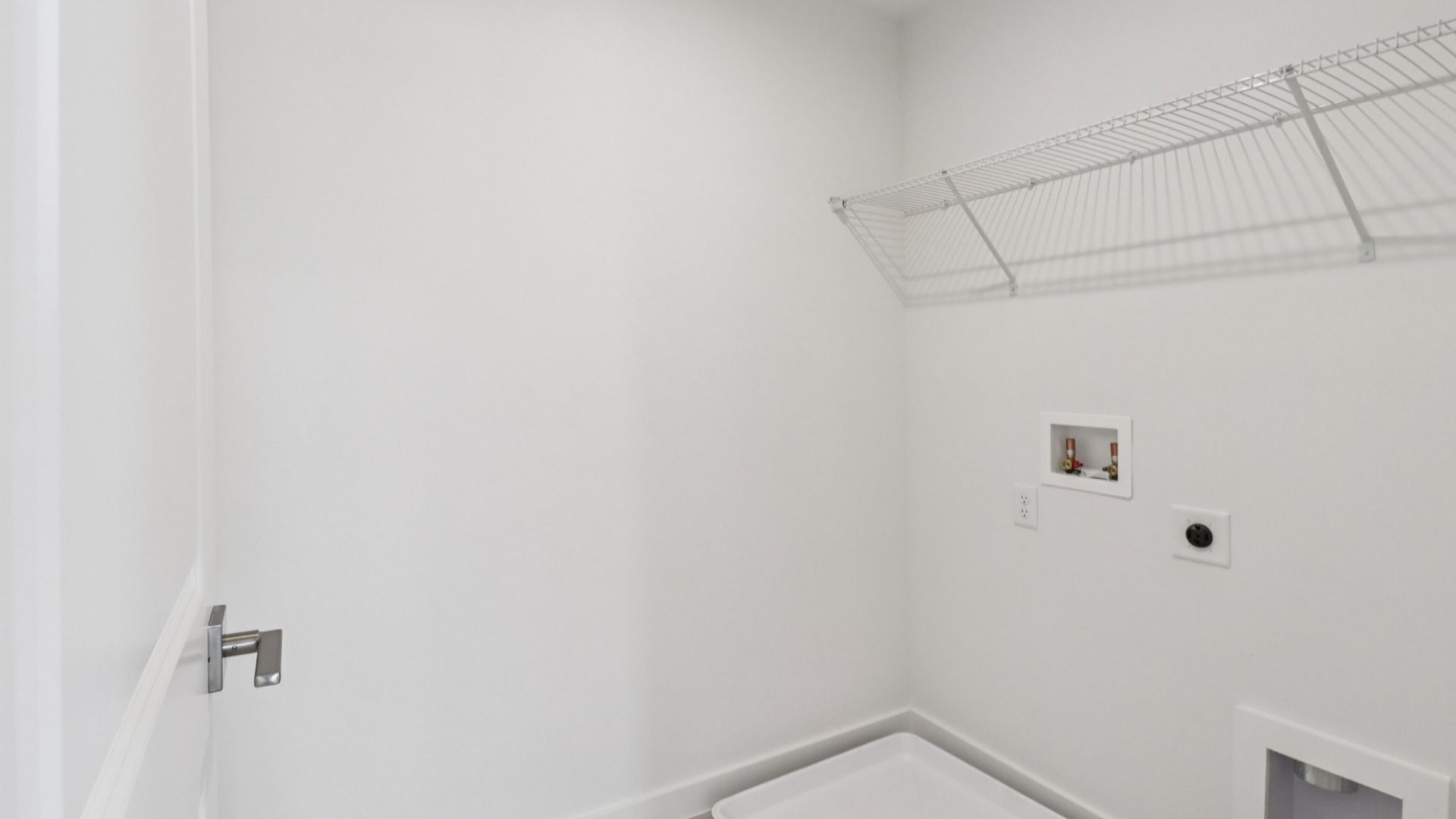 Laundry Room in the Monterey End Townhome by DRB Homes - Cyrene at Harmony in St Cloud FL