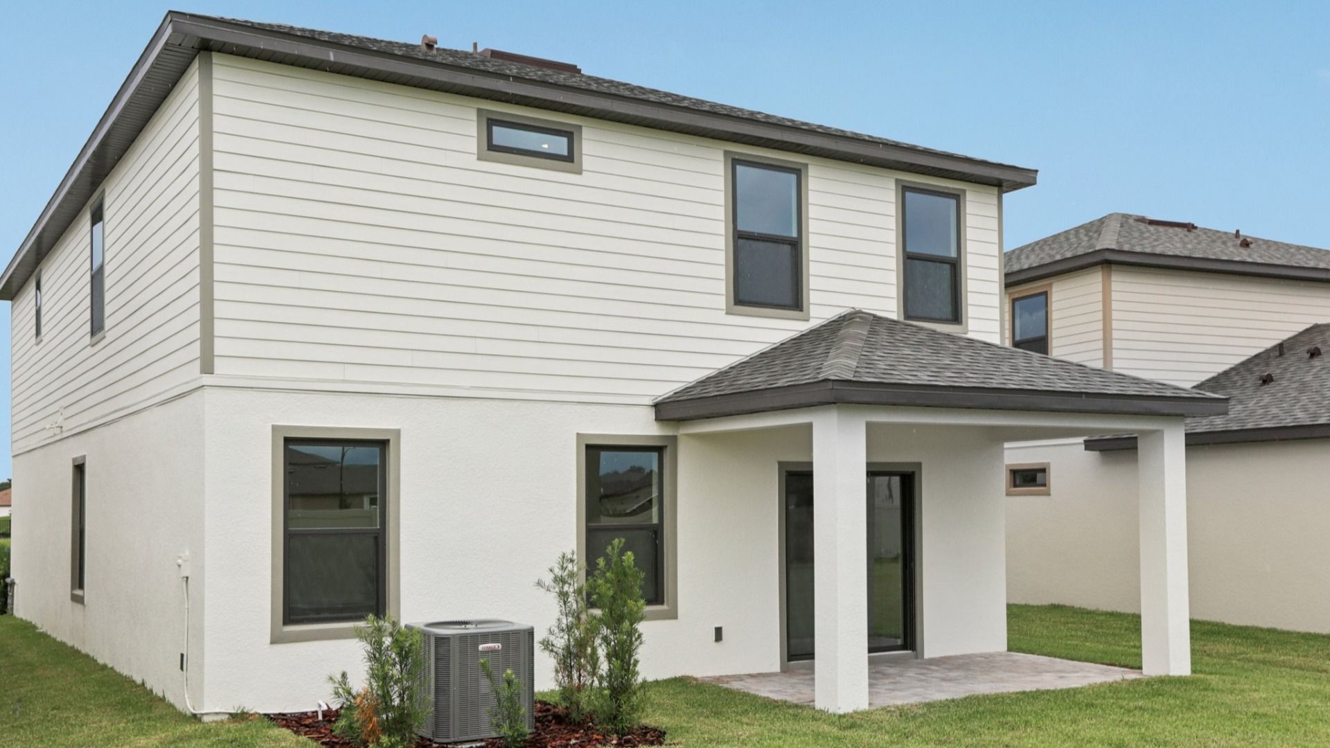 Back Exterior Ponte Vedra Model by DRB Homes at Grasslands West in Lakeland FL