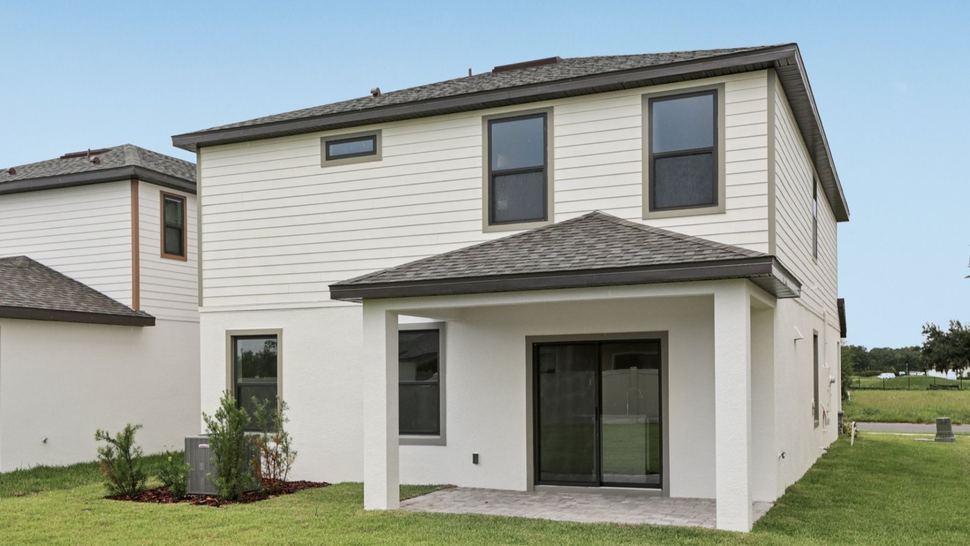 Back Exterior Ponte Vedra Model by DRB Homes at Grasslands West in Lakeland FL