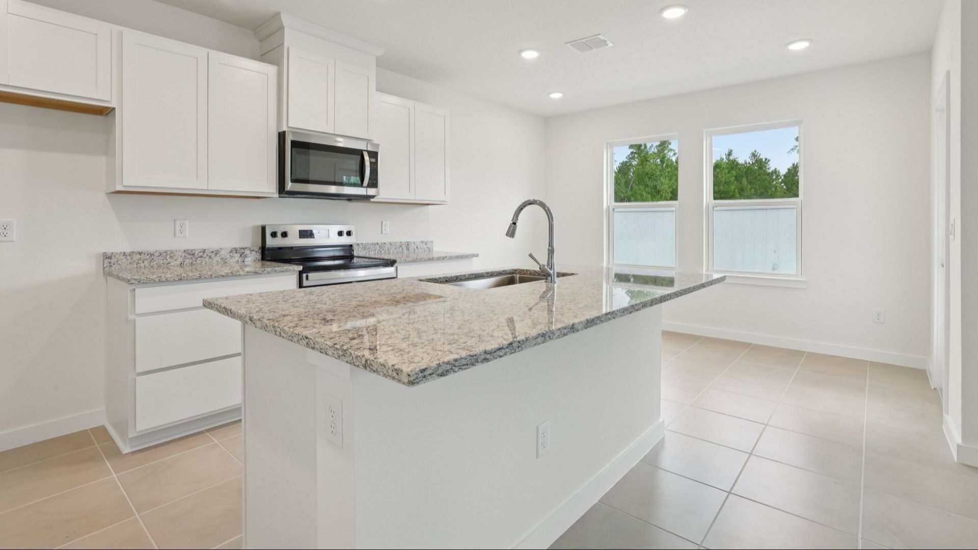 Kitchen of the Coronado - End at Cyrene at Harmony located in St Cloud FL by DRB Homes
