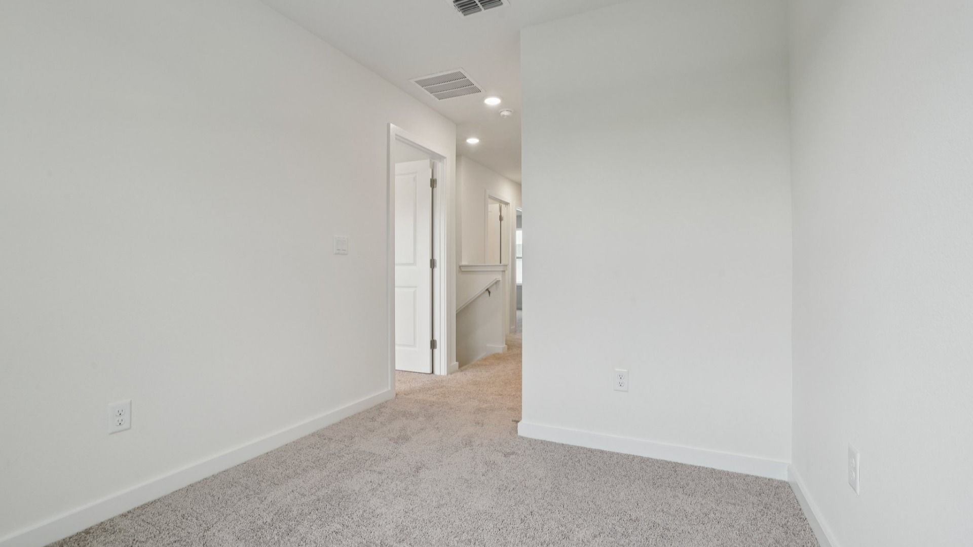 Upstairs Hallway of the Coronado - End at Cyrene at Harmony located in St Cloud FL by DRB Homes