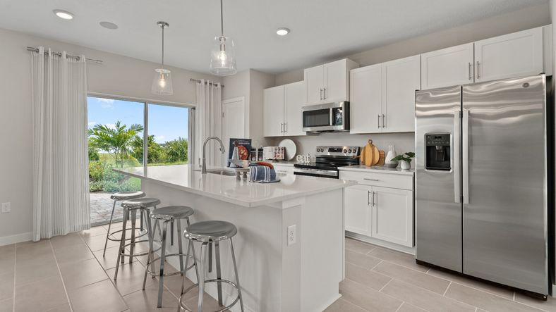 Ponte Vedra Model Kitchen and Island at Willowbrook North by DRB Homes in Winter Haven FL