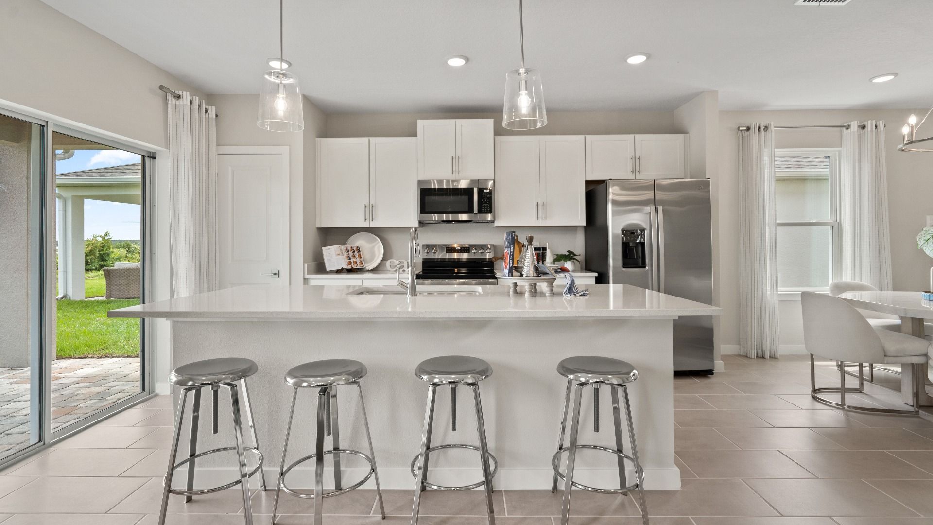 Ponte Vedra Model Kitchen and Island at Willowbrook North by DRB Homes in Winter Haven FL