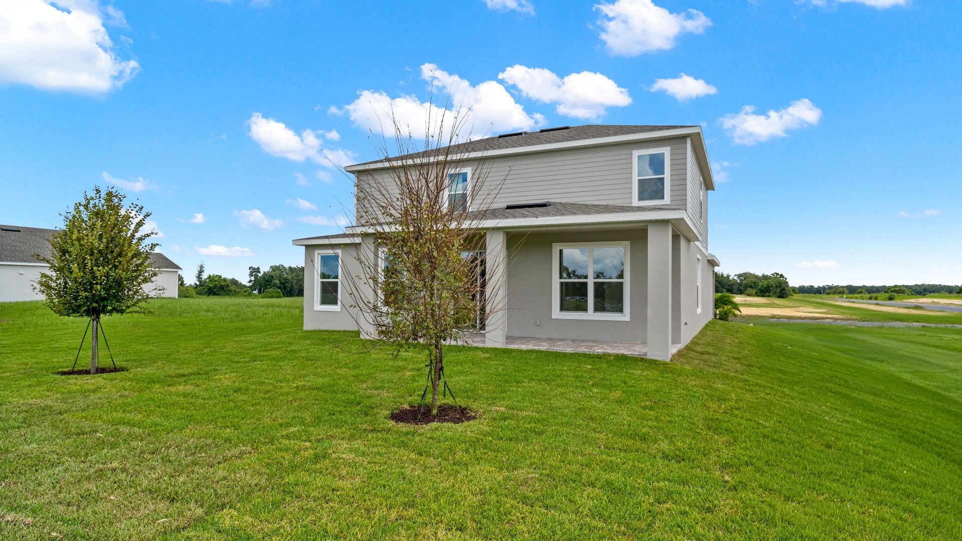 The Sweetgum two story 4 bedroom and 3.5 bath home Quick Move in Home located at Trailside in Mount Dora by DRB Homes