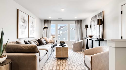 Sophisticated Richvale Estates living room boasting modern furnishings, ample natural light, and tasteful decor.