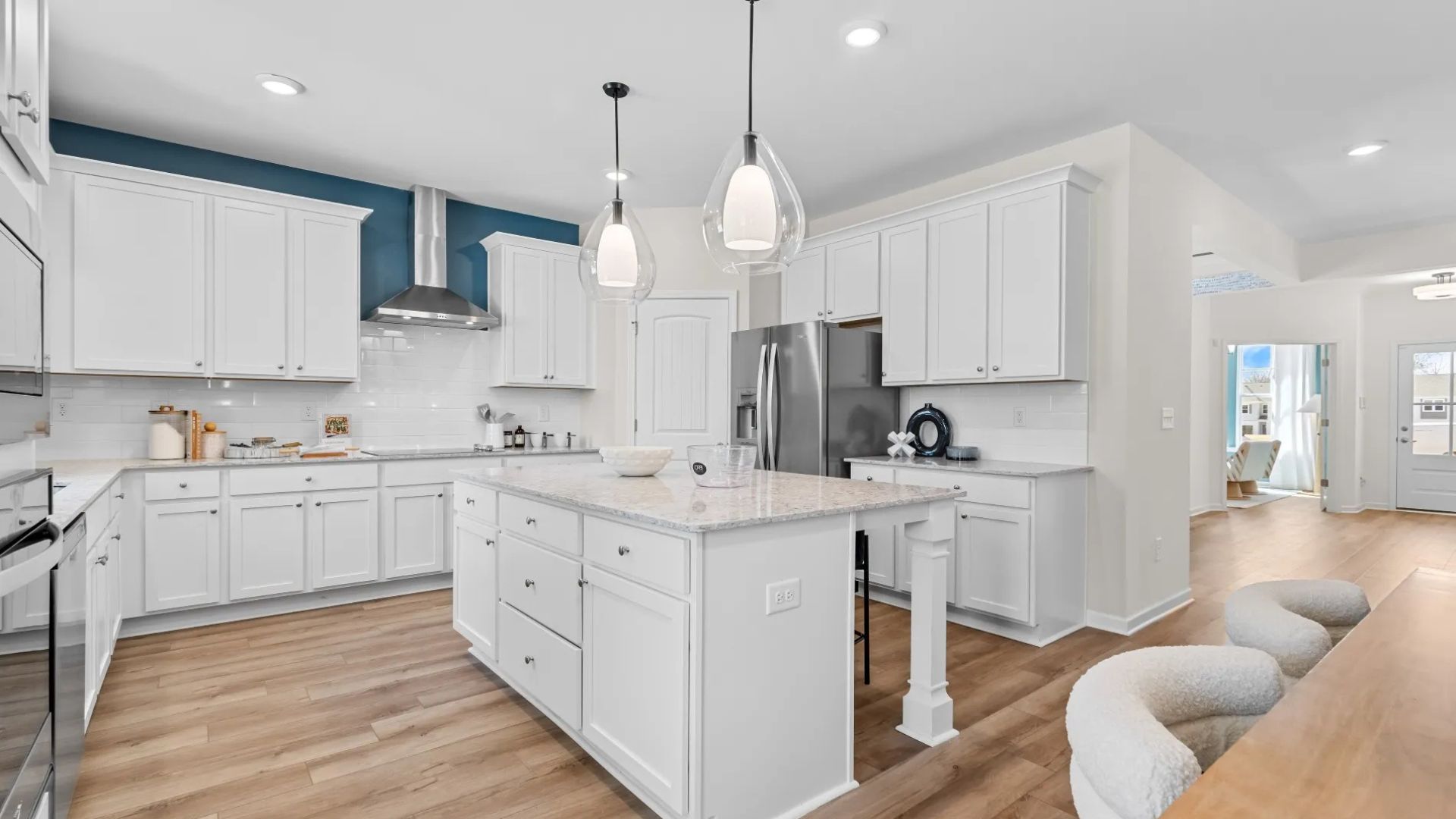 Open-concept kitchen with island, perfect for cooking, dining, and entertaining.