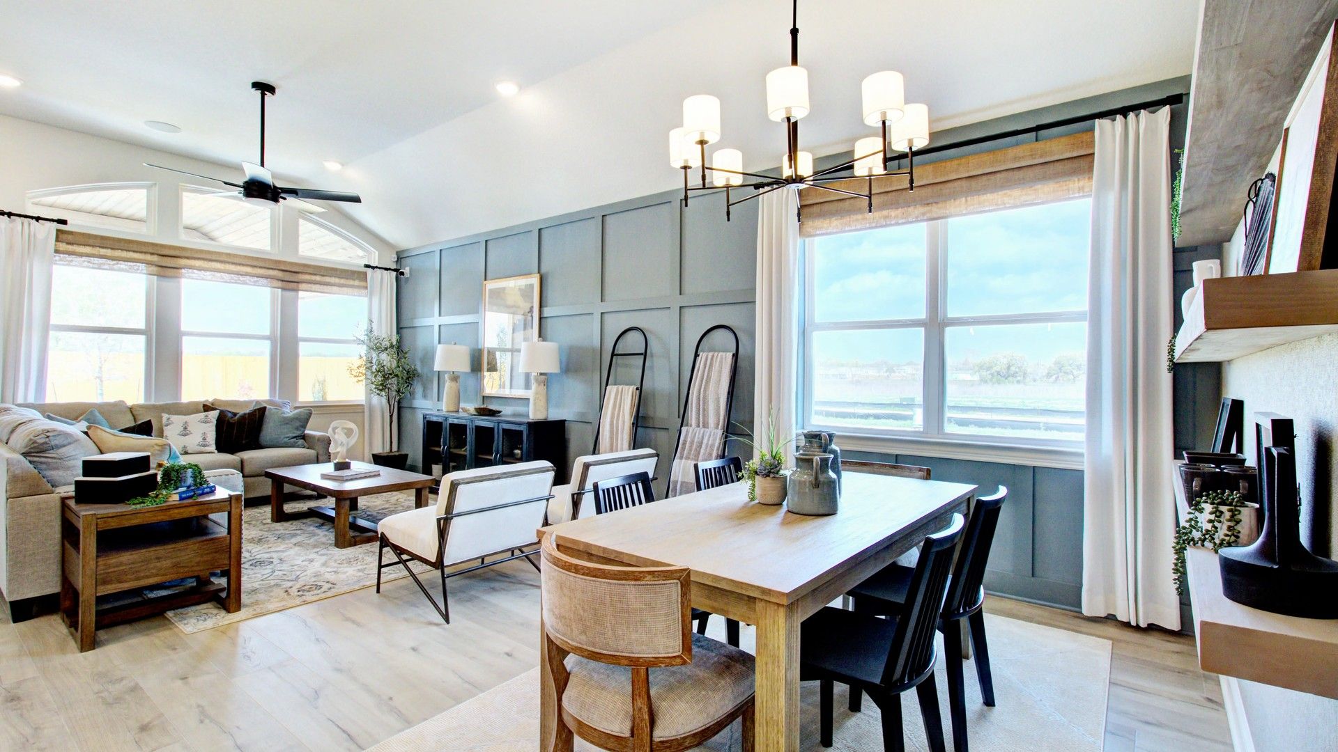 Sophisticated vaulted ceiling and ambient chandelier in Veranda Community home exude elegance.