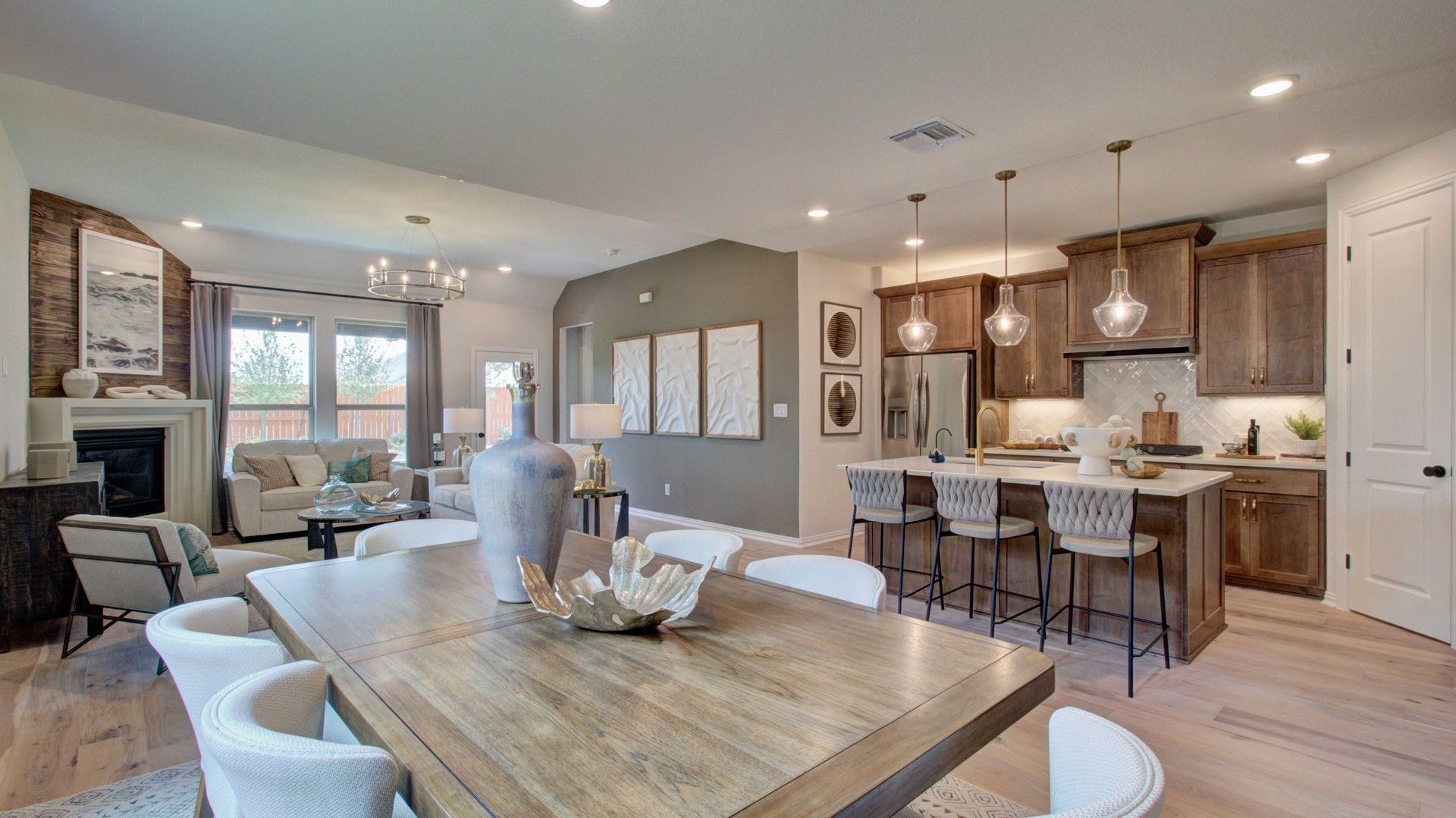 Elegant open layout, warm wood cabinetry, luxurious lighting fixtures. Located in the sought-after Meyer Ranch.