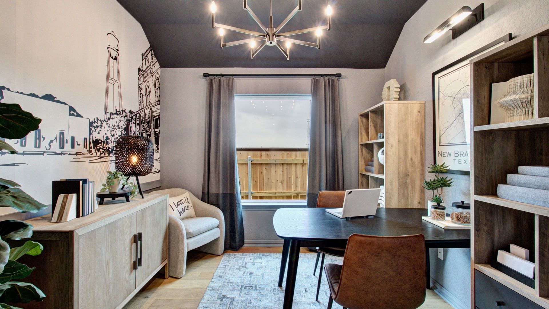Exquisite home office featuring a dramatic mural, and chic chandelier in Sunflower Ridge enclave.