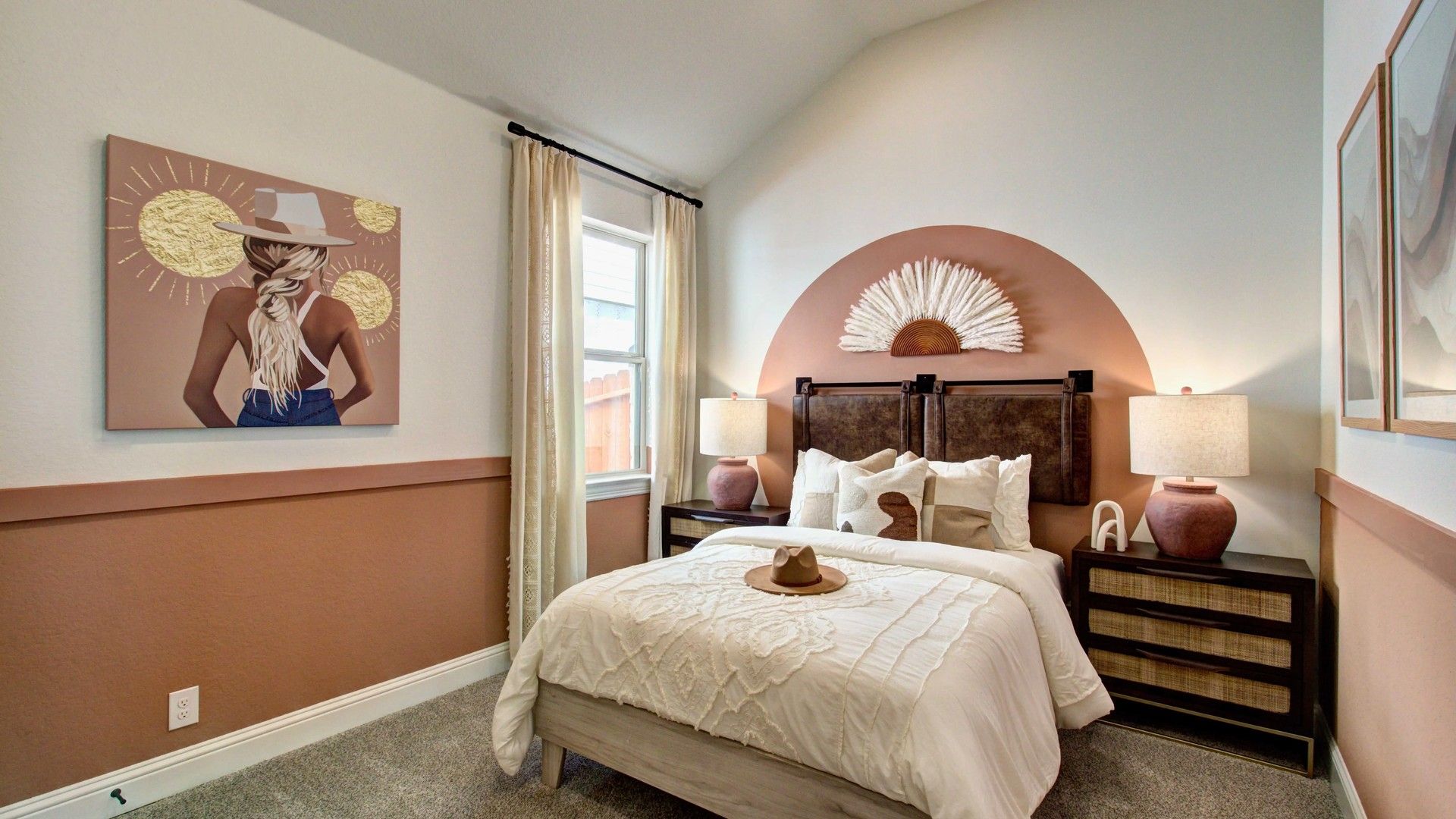 Experience vaulted ceilings and refined earth tones in this Meyer Ranch bedroom. Exquisite detailing enchants.