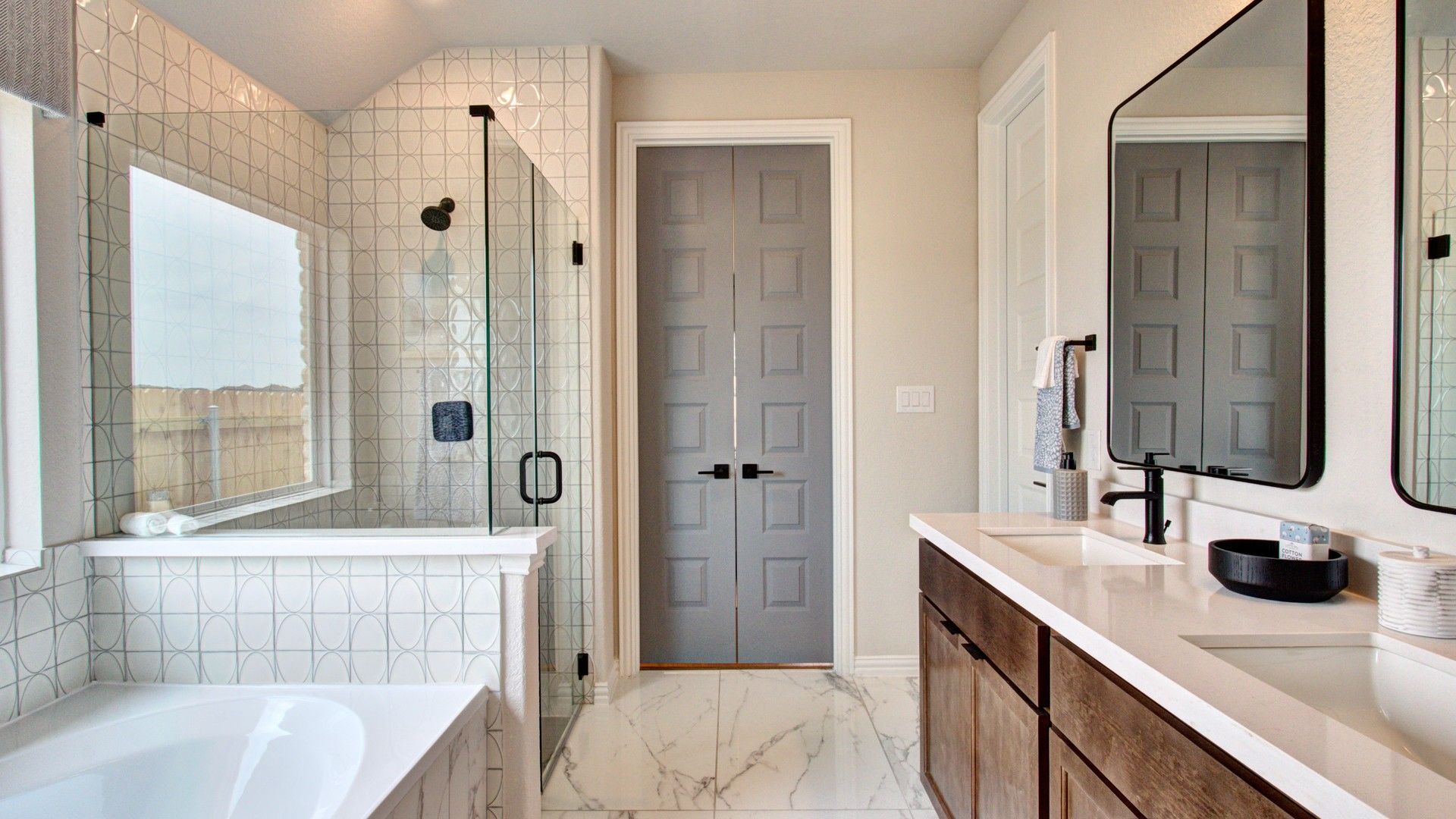 Experience opulence with marble floors, glass shower, and elegant design at Sunflower Ridge.