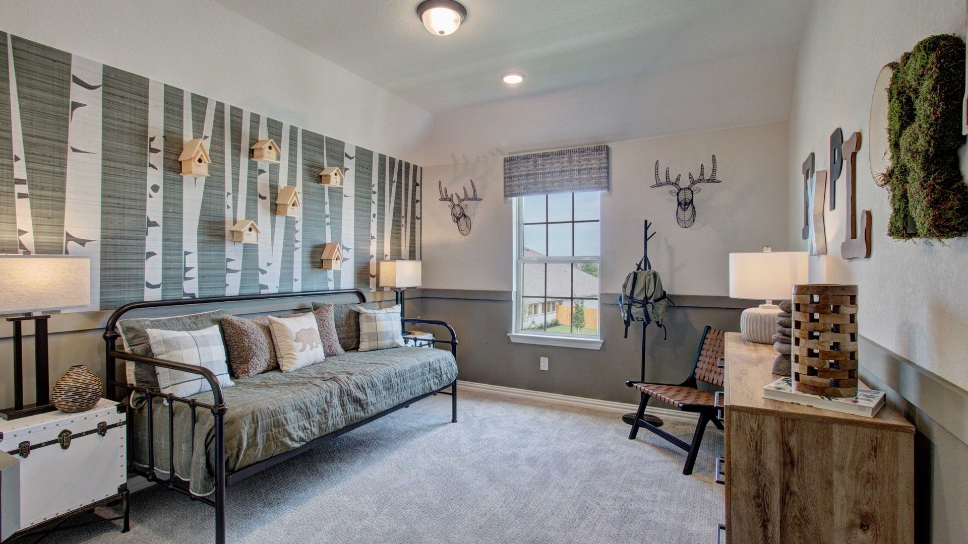 Experience rustic charm with birch wallpaper and elegant accents in Meyer Ranch Enclave, Texas.