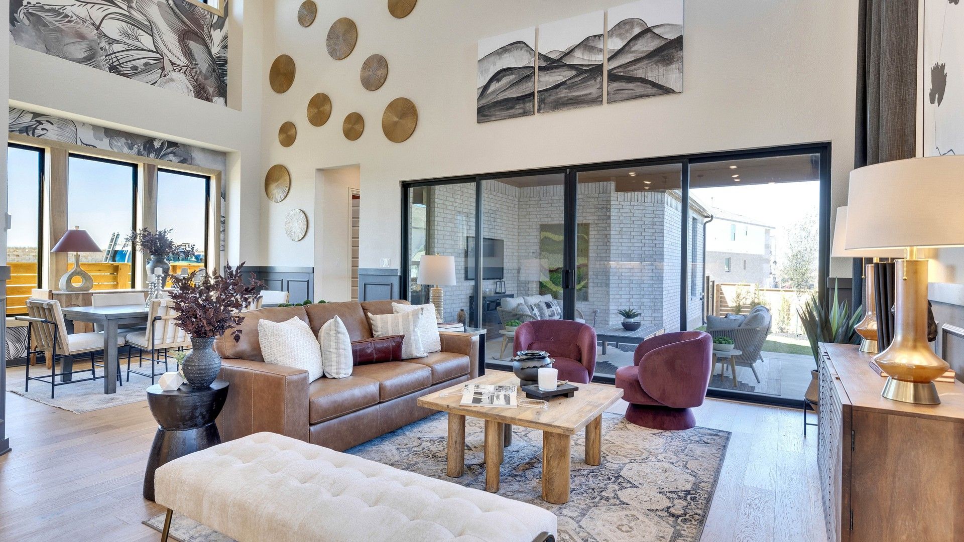 Expansive high ceilings and elegant modern accents elevate this exclusive Flora community residence.