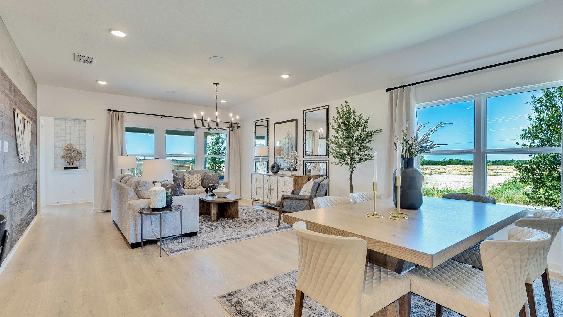 Experience luxury with elegant hardwood floors and panoramic windows in Hunters Glen.