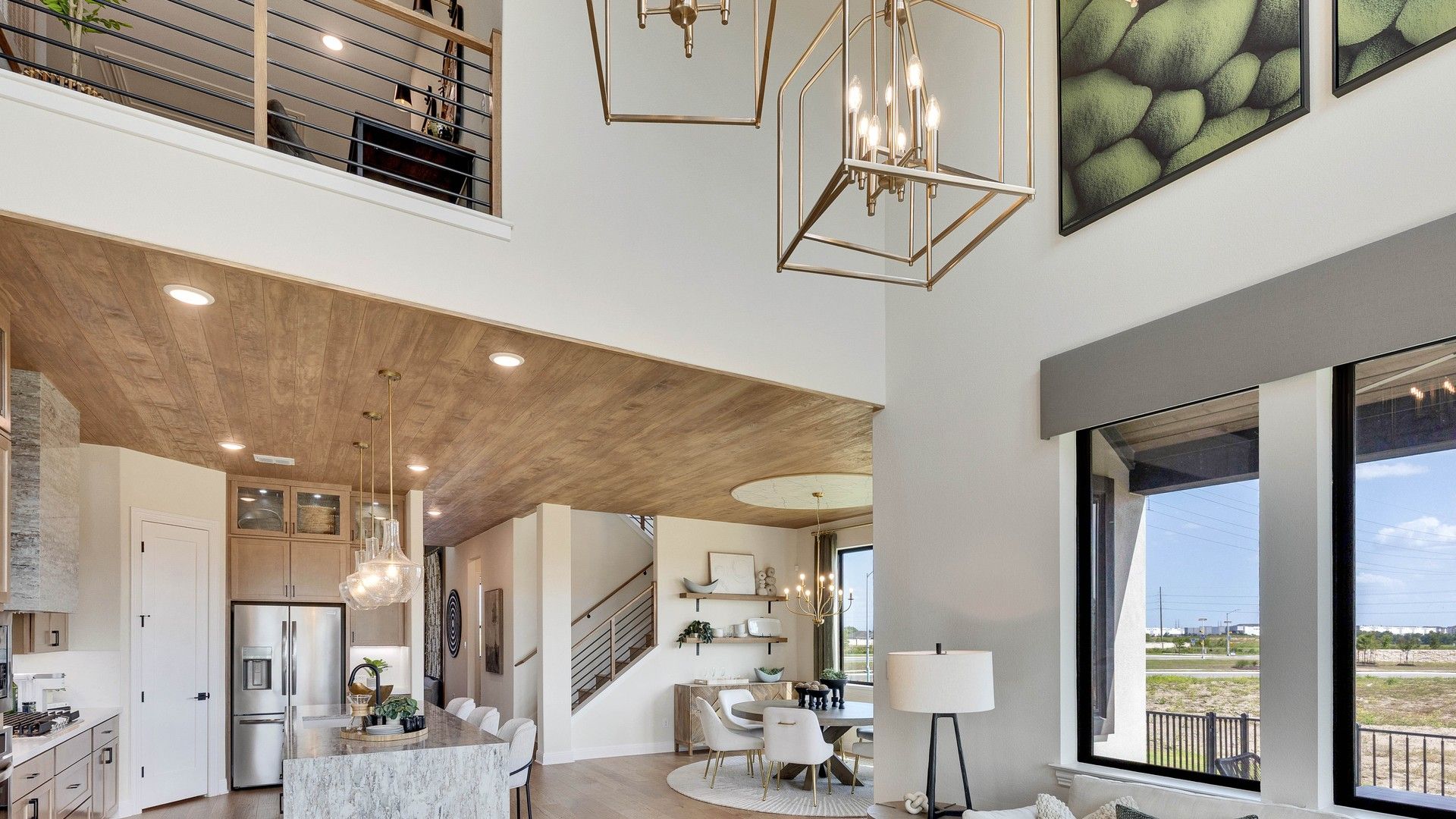 Experience opulence with soaring ceilings, exquisite chandeliers, and expansive windows at Lakeside Meadows.