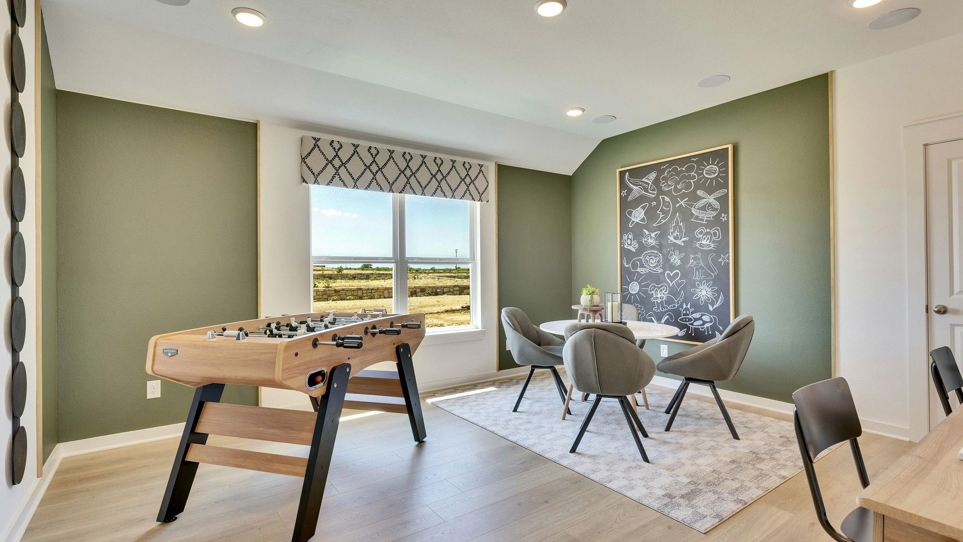 Luxurious game room features chic furnishings, elegant decor, and panoramic views in Hunters Glen.