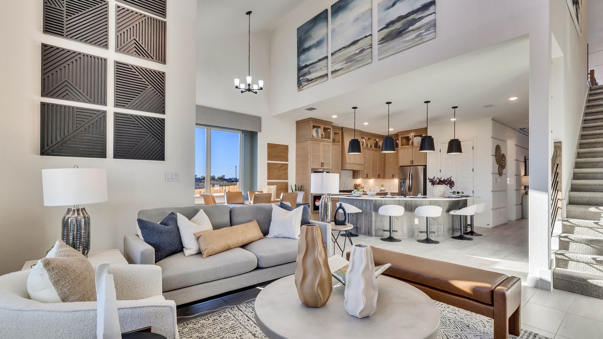 Expansive high ceilings and chic lighting elevate luxury in Creeks Crossing.