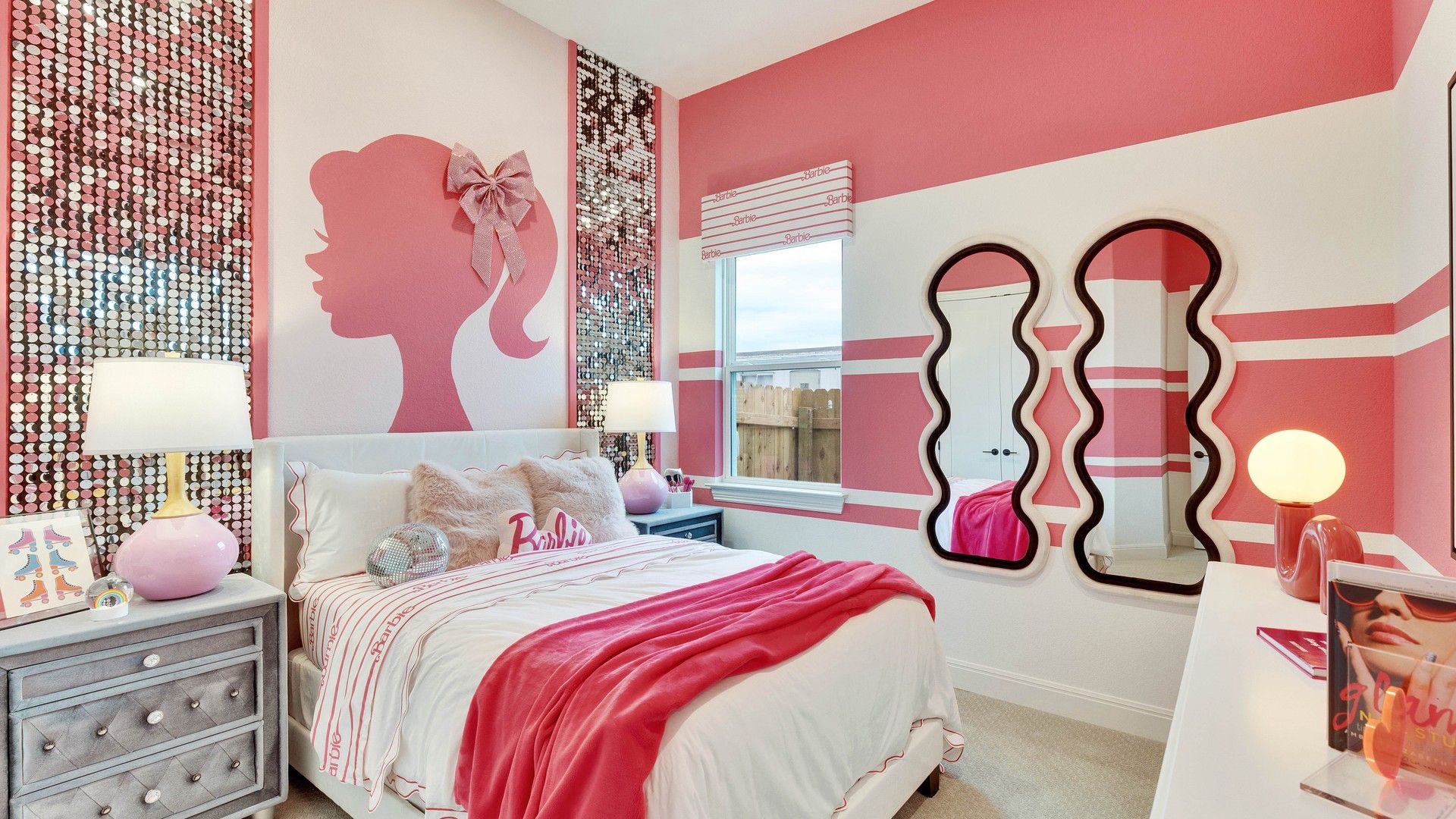 Opulent pink hues grace this bedroom with shimmering sequin walls and artistic mural in Spring Creek.
