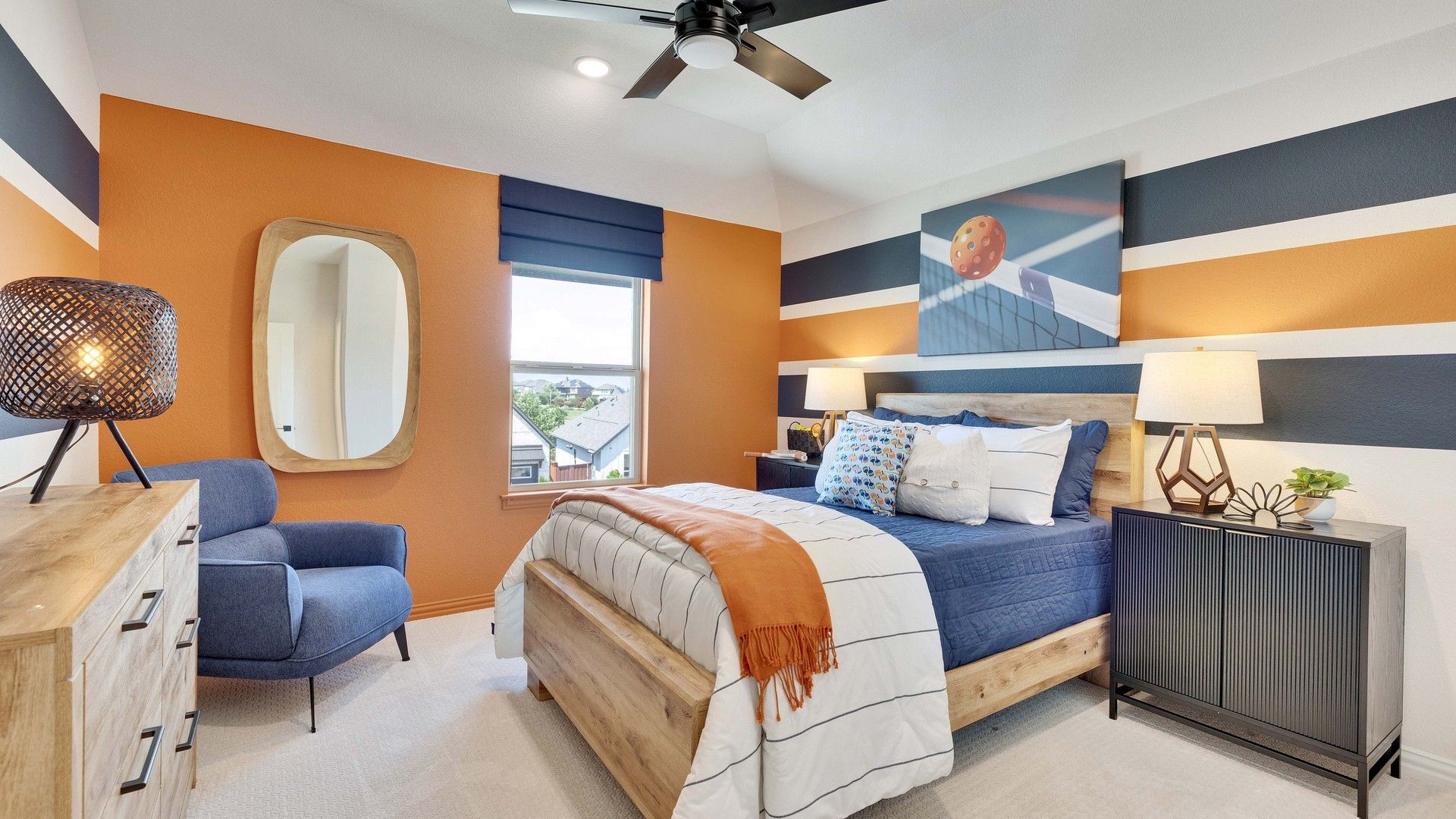 Elegant bedroom features striped accent walls and designer furnishings in the prestigious Sunfield community.