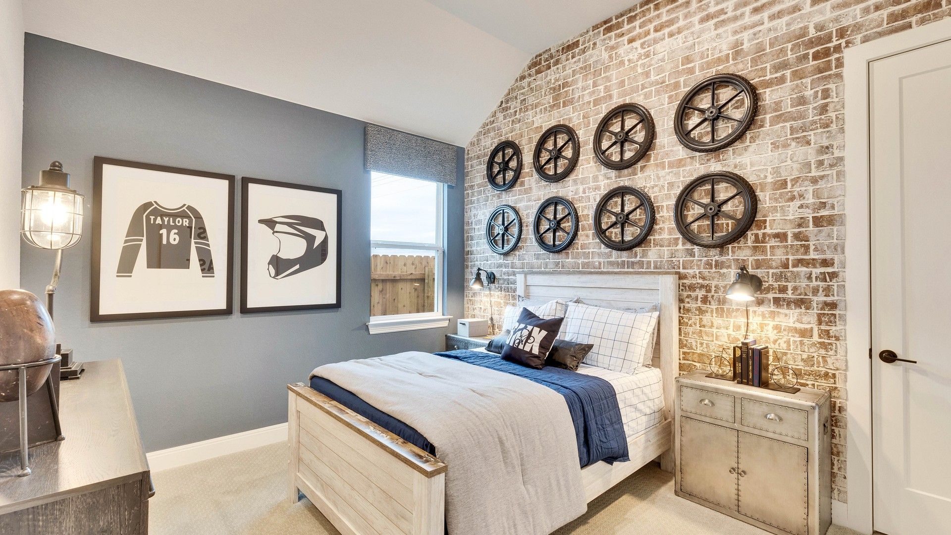 Experience refined living with a stylish brick accent wall and unique wheel decor in Spring Creek.